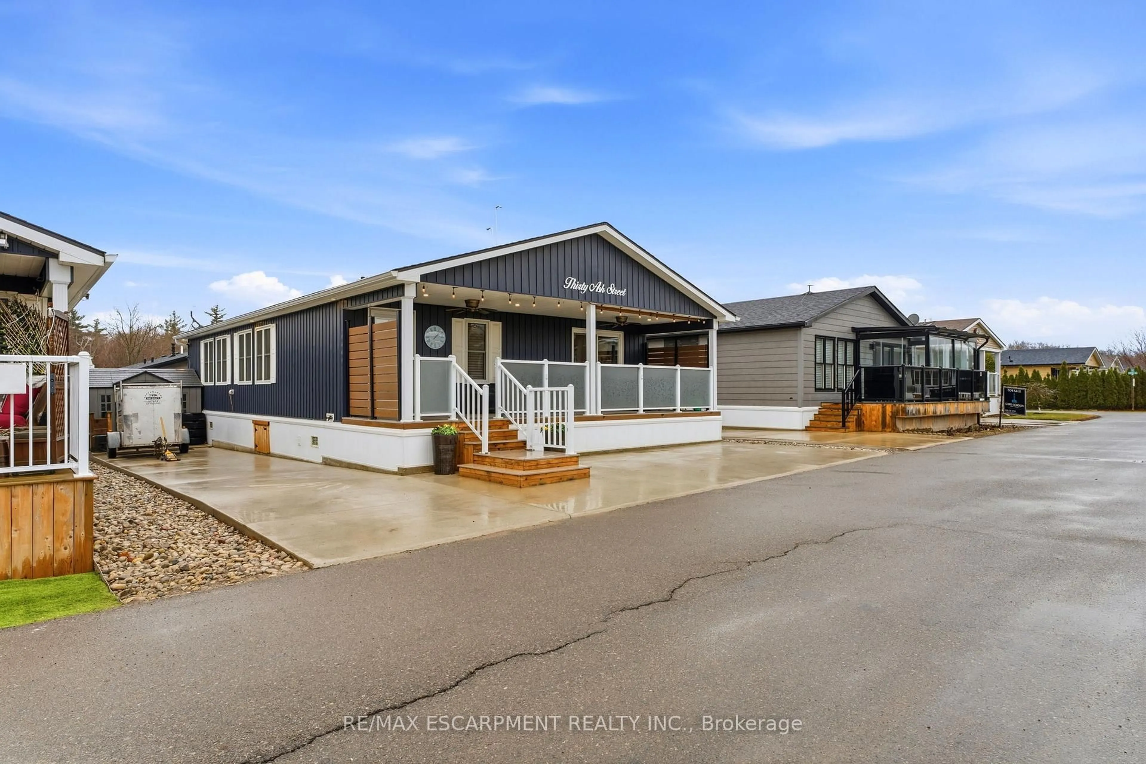 A pic from outside/outdoor area/front of a property/back of a property/a pic from drone, street for 4449 Milburough Line #30 Ash Street, Burlington Ontario L7P 0C5