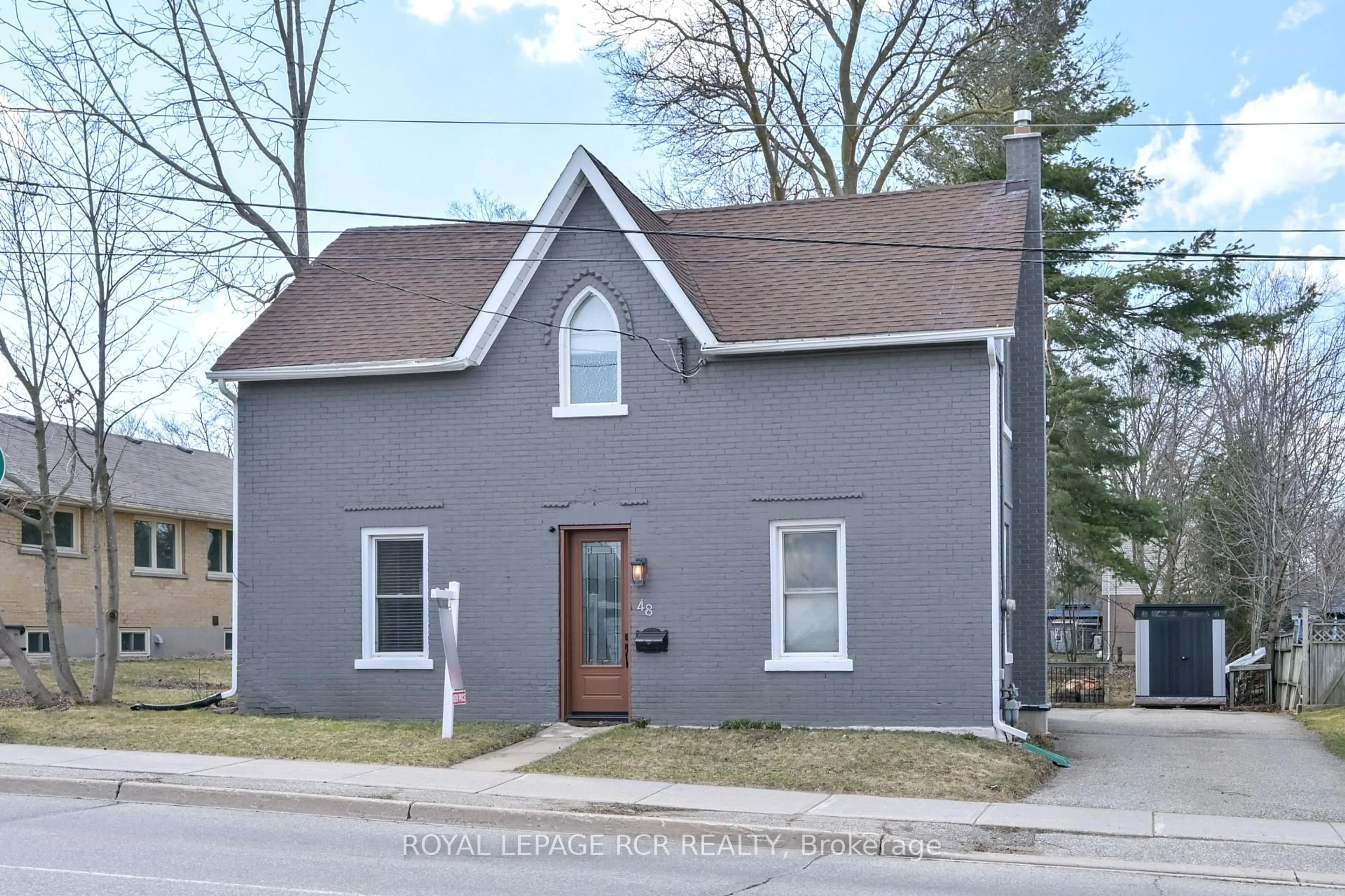 Home with vinyl exterior material, street for 48 Townline, Orangeville Ontario L9W 1T9