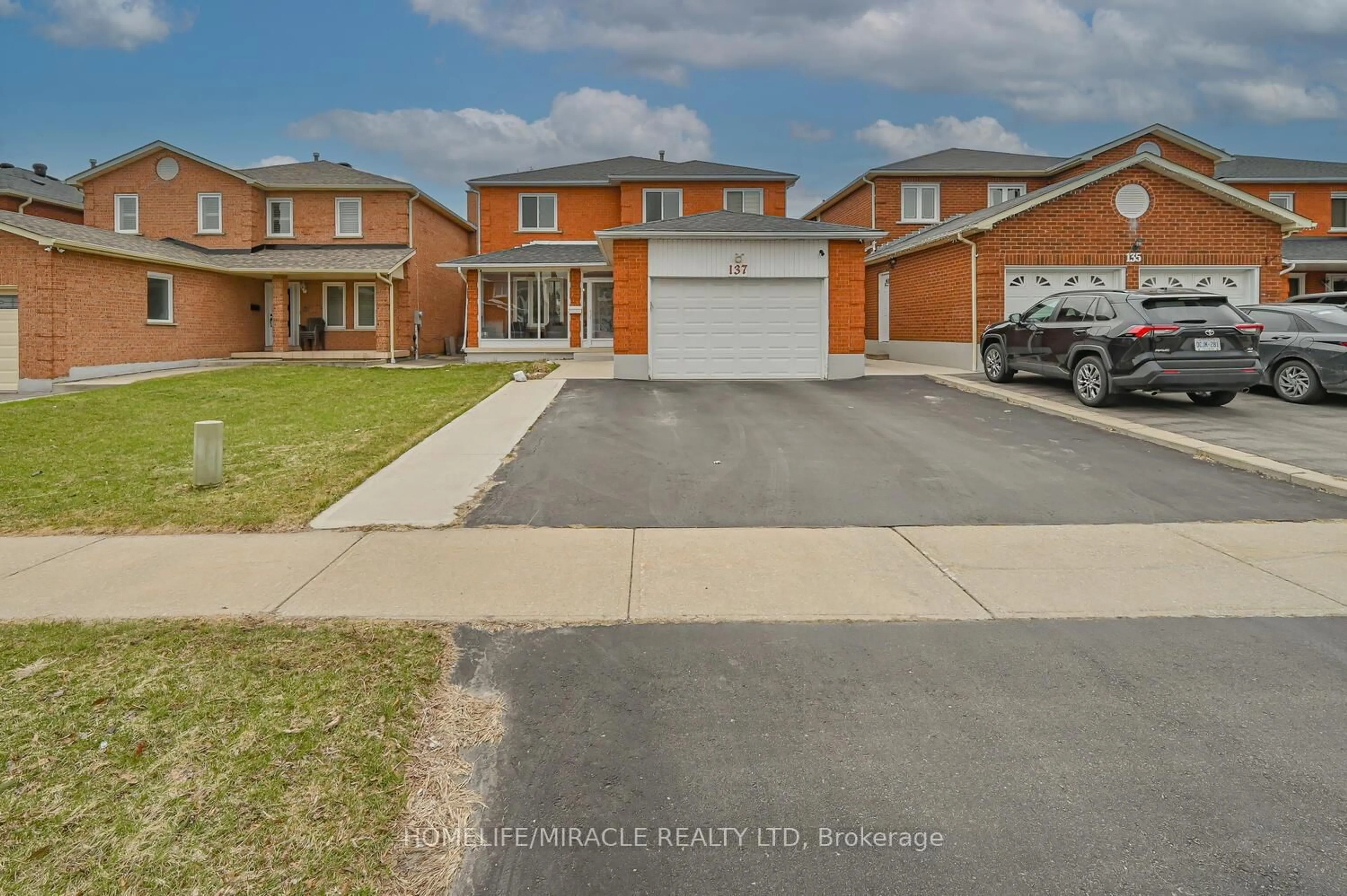 A pic from outside/outdoor area/front of a property/back of a property/a pic from drone, street for 137 Minglehaze Dr, Toronto Ontario M9V 4W7