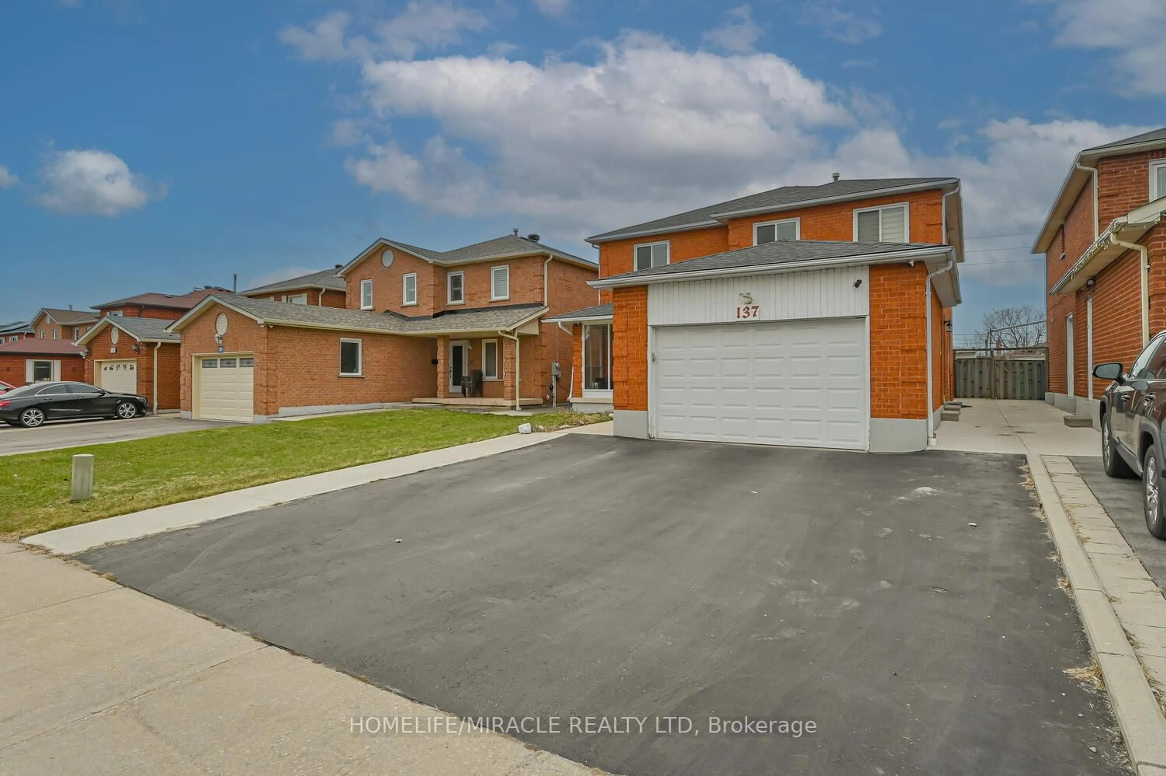 Home with brick exterior material, street for 137 Minglehaze Dr, Toronto Ontario M9V 4W7