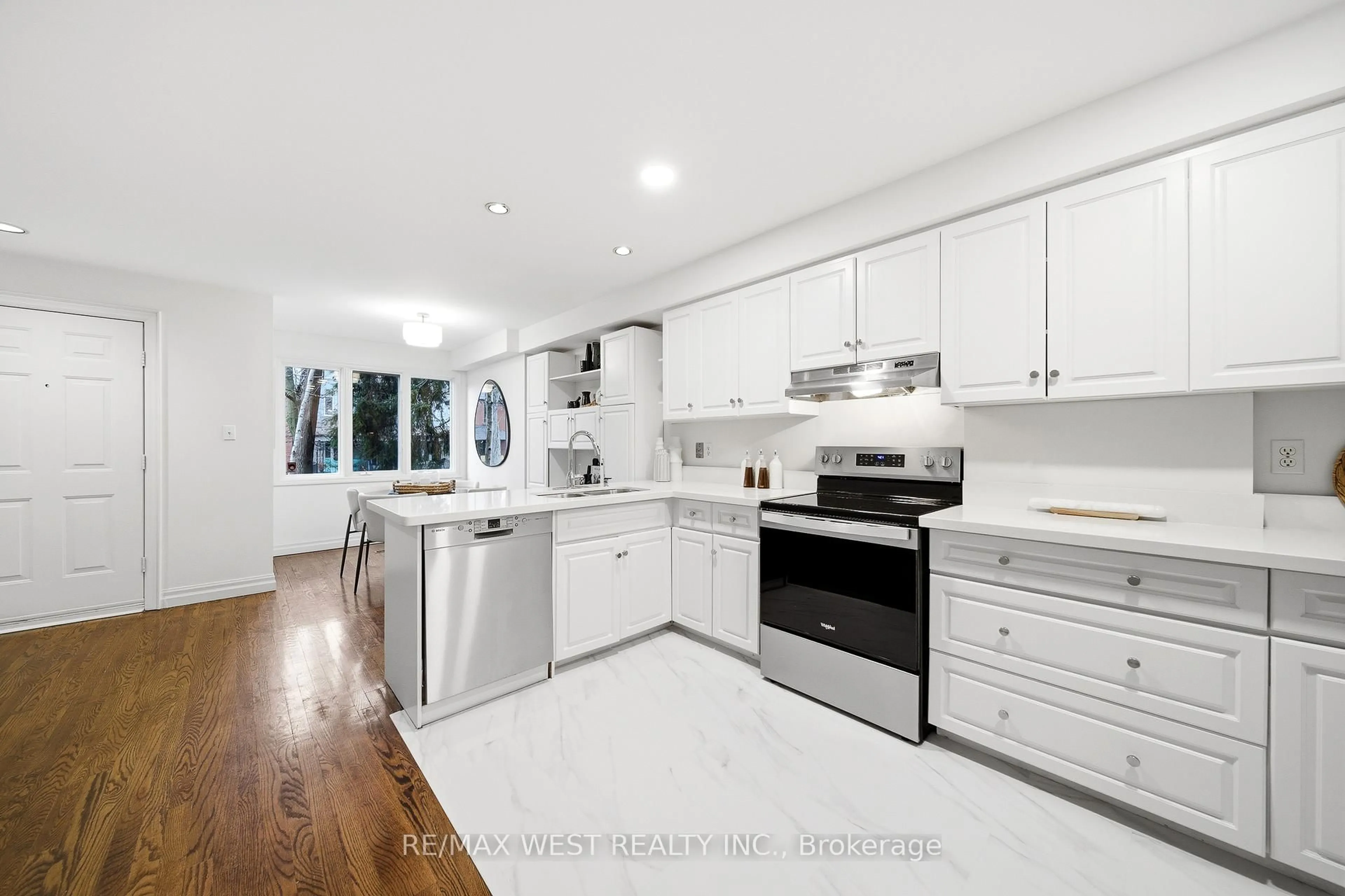 Open concept kitchen, ceramic/tile floor for 79 Laws St, Toronto Ontario M6P 2Y8