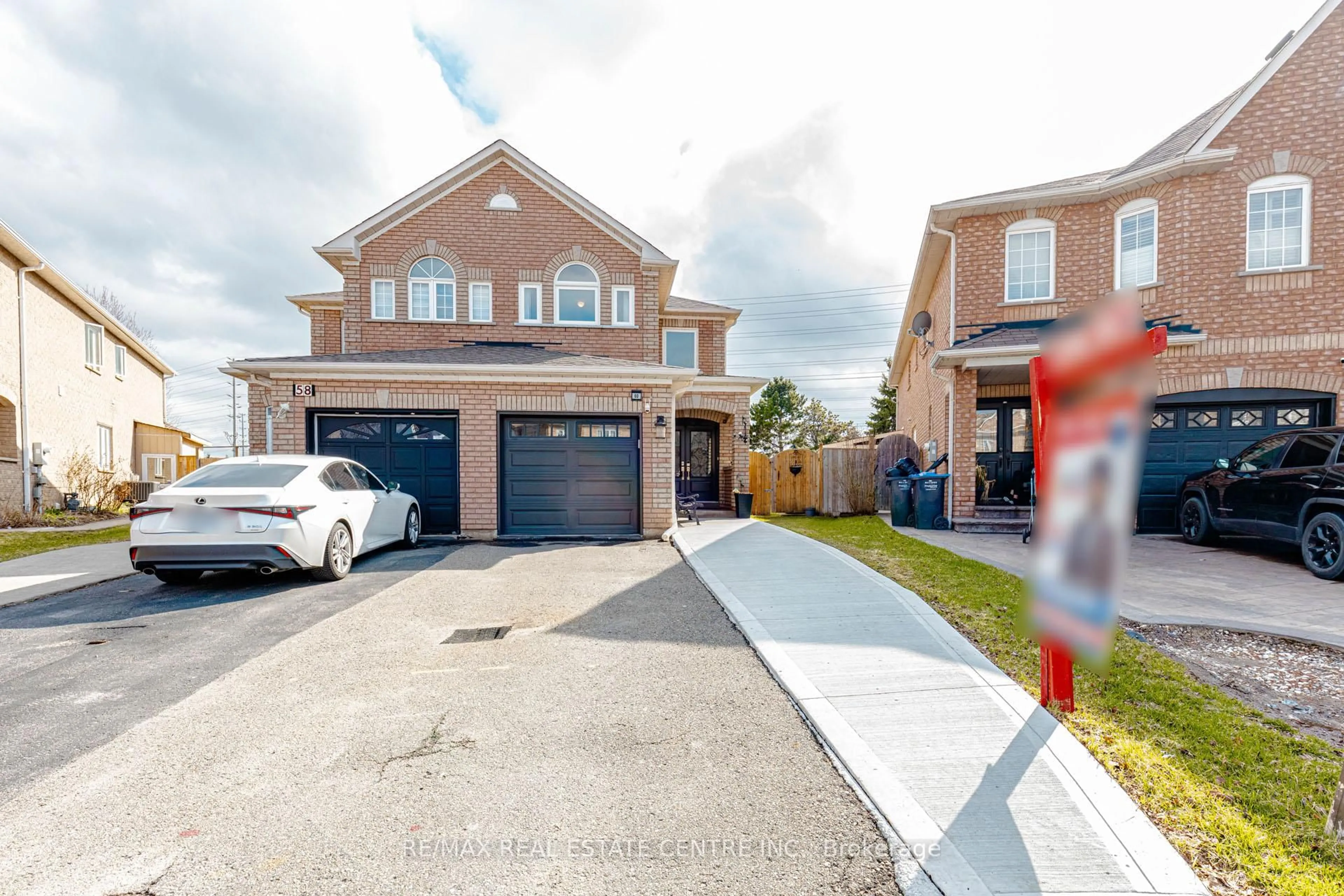 Home with brick exterior material, street for 60 Native Landing, Brampton Ontario L6X 5B1