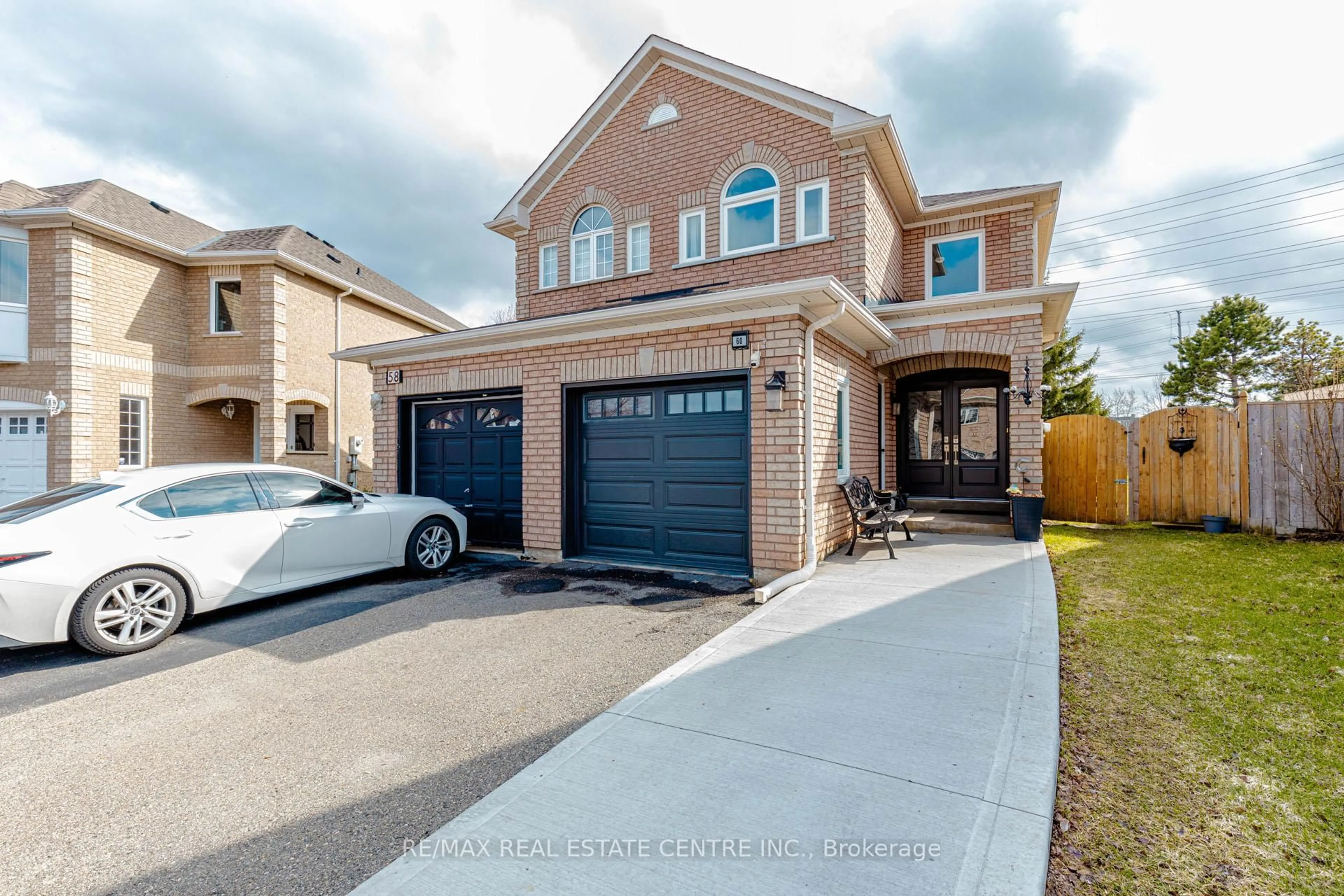Home with brick exterior material, street for 60 Native Landing, Brampton Ontario L6X 5B1