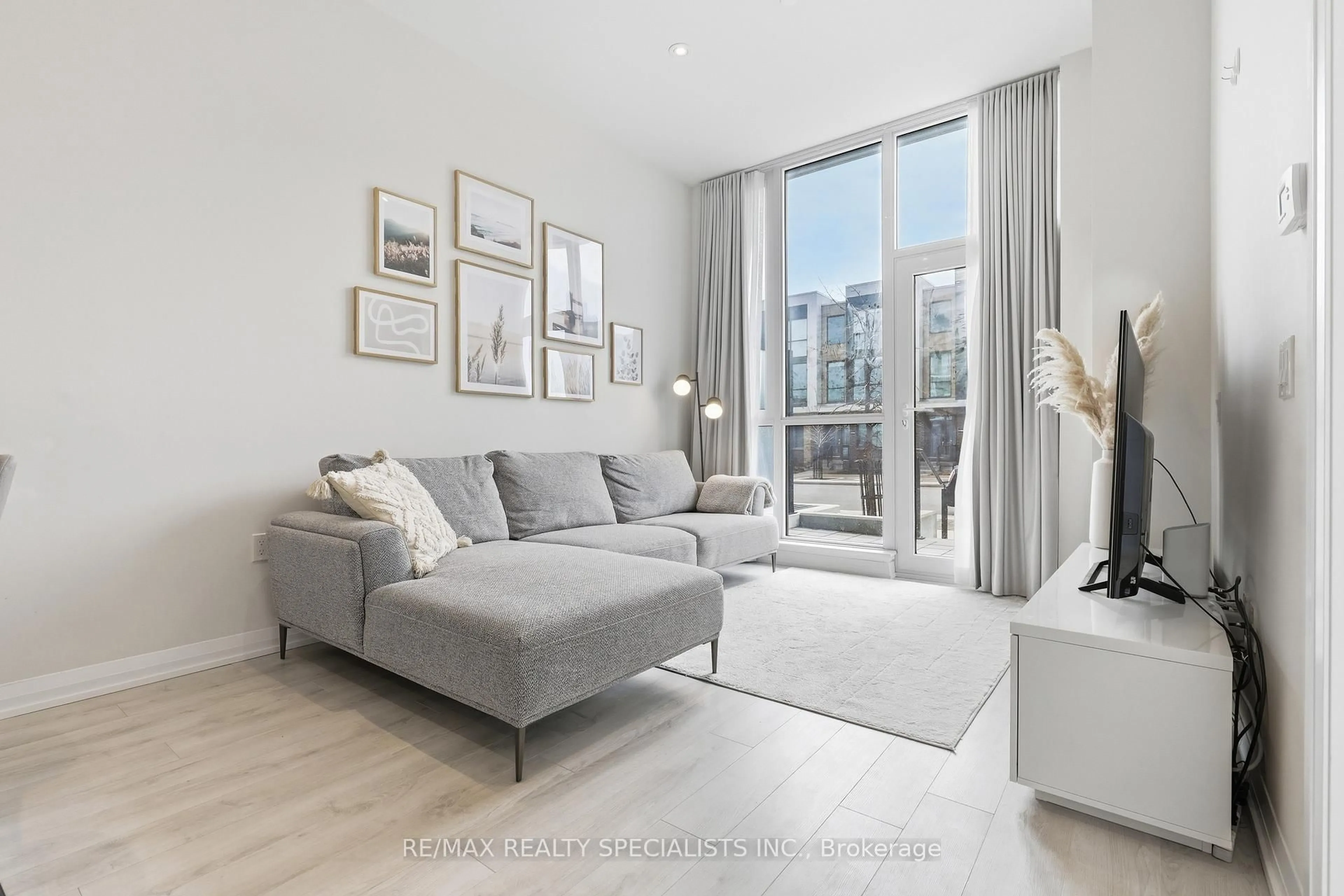 Living room with furniture, unknown for 65 Watergarden Dr #A5, Mississauga Ontario L5R 0G9