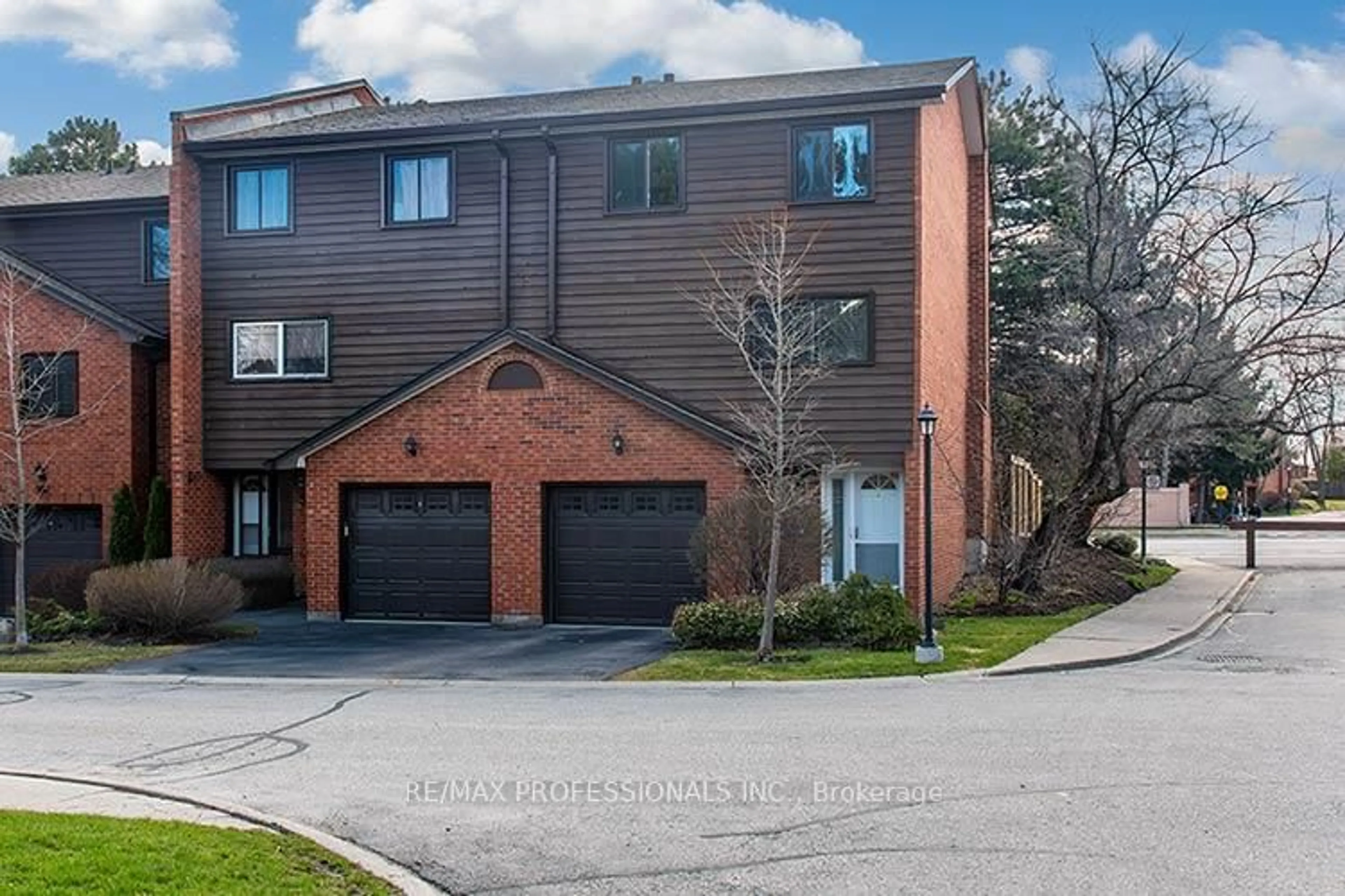 Home with brick exterior material, street for 4230 Fieldgate Dr #34, Mississauga Ontario L4W 2M5