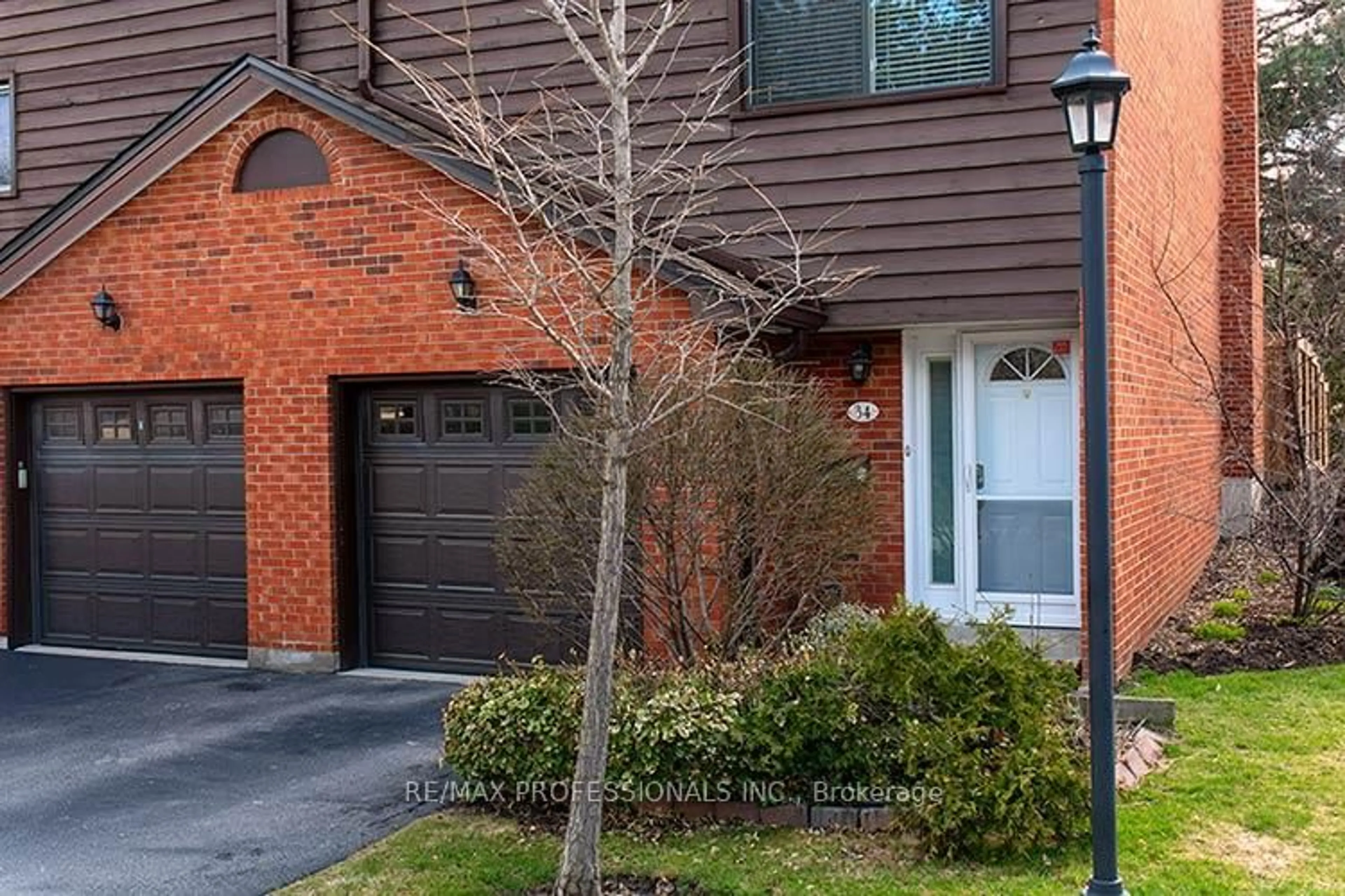 Home with brick exterior material, street for 4230 Fieldgate Dr #34, Mississauga Ontario L4W 2M5