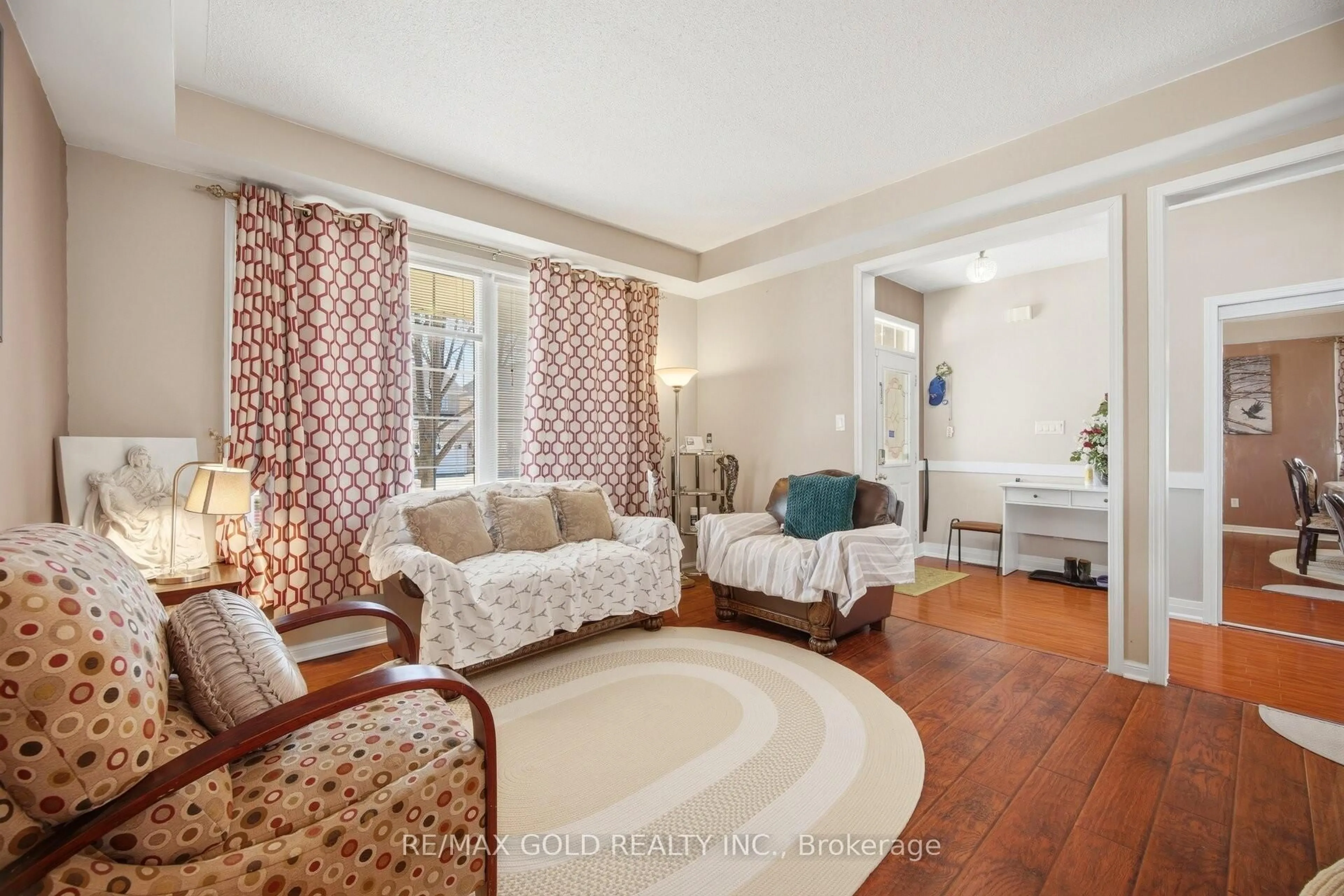 Living room with furniture, unknown for 28 Latania Blvd, Brampton Ontario L6P 1S9