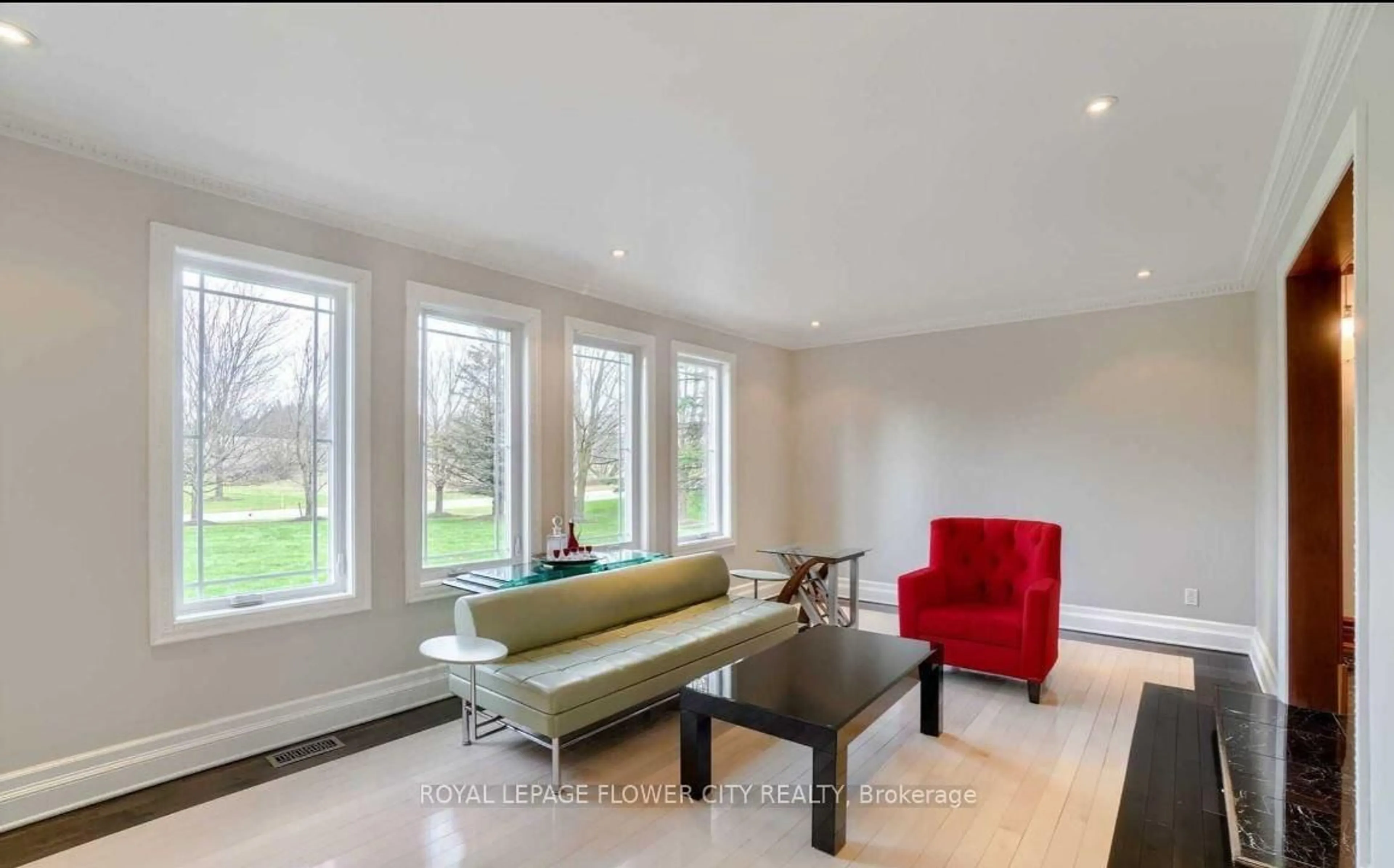 Living room with furniture, wood/laminate floor for 27 McCauley Dr, Caledon Ontario L7E 0B6