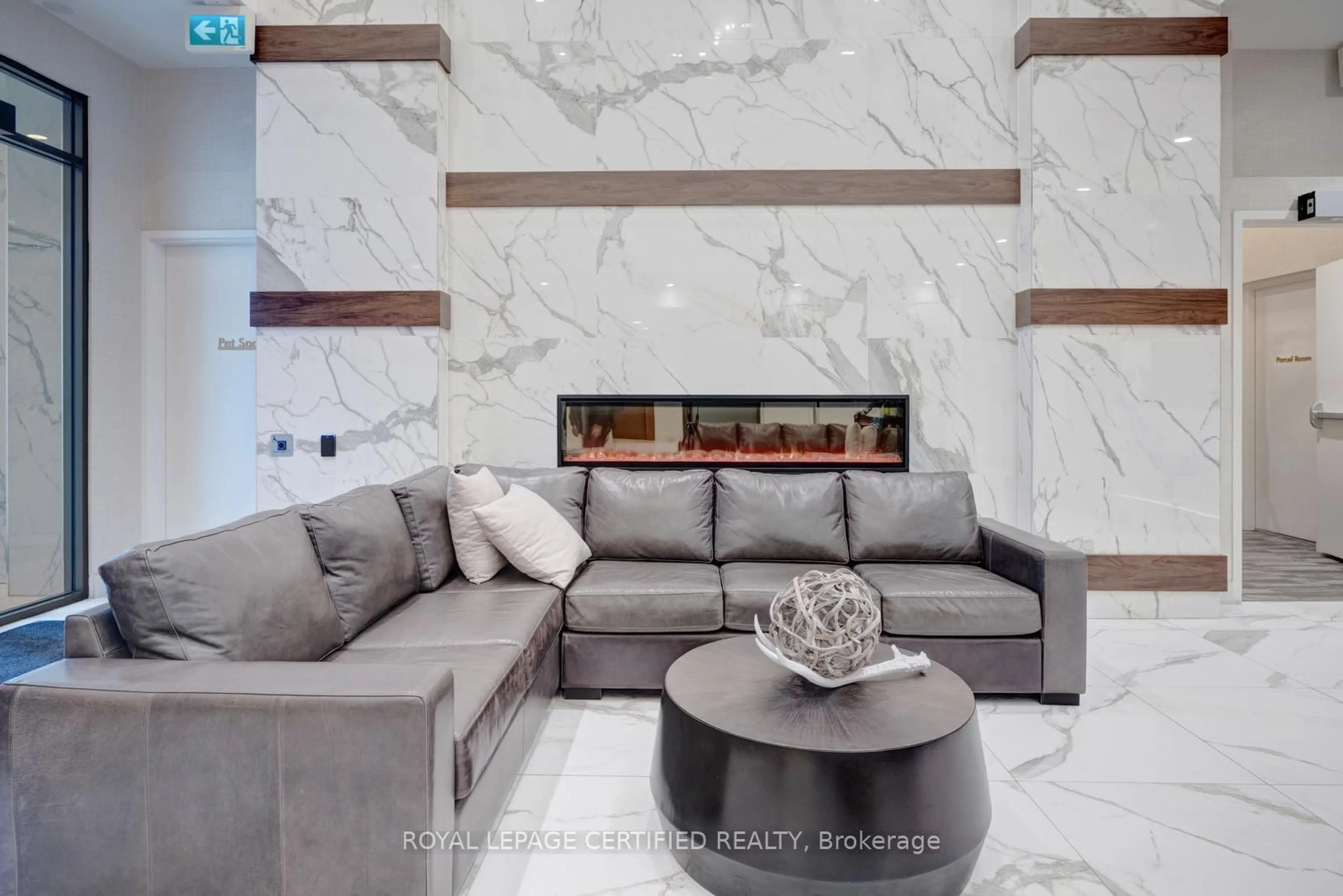 Living room with furniture, ceramic/tile floor for 1050 Main St #114, Milton Ontario L9T 9M3