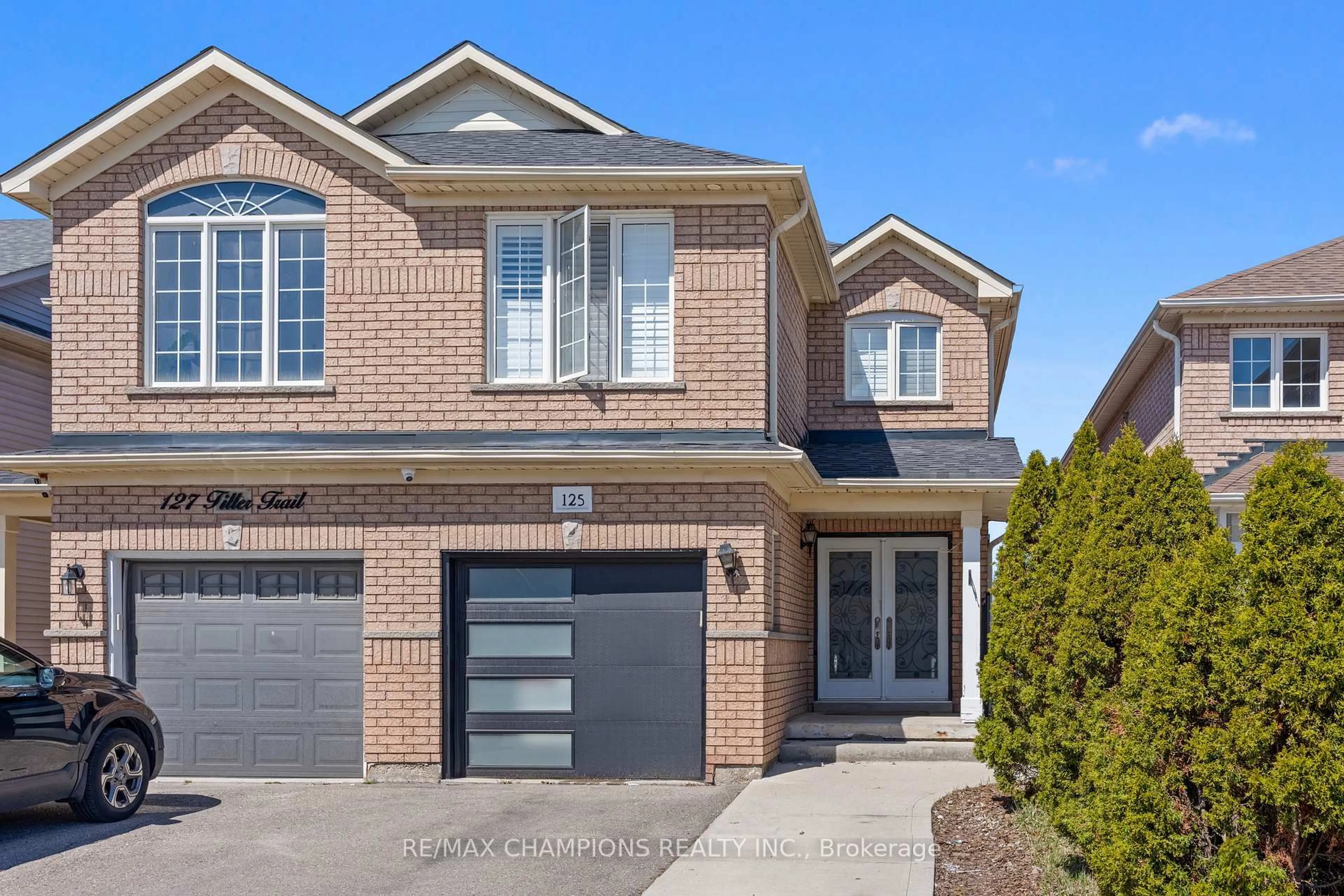 Home with brick exterior material, street for 125 Tiller Tr, Brampton Ontario L6X 4S9