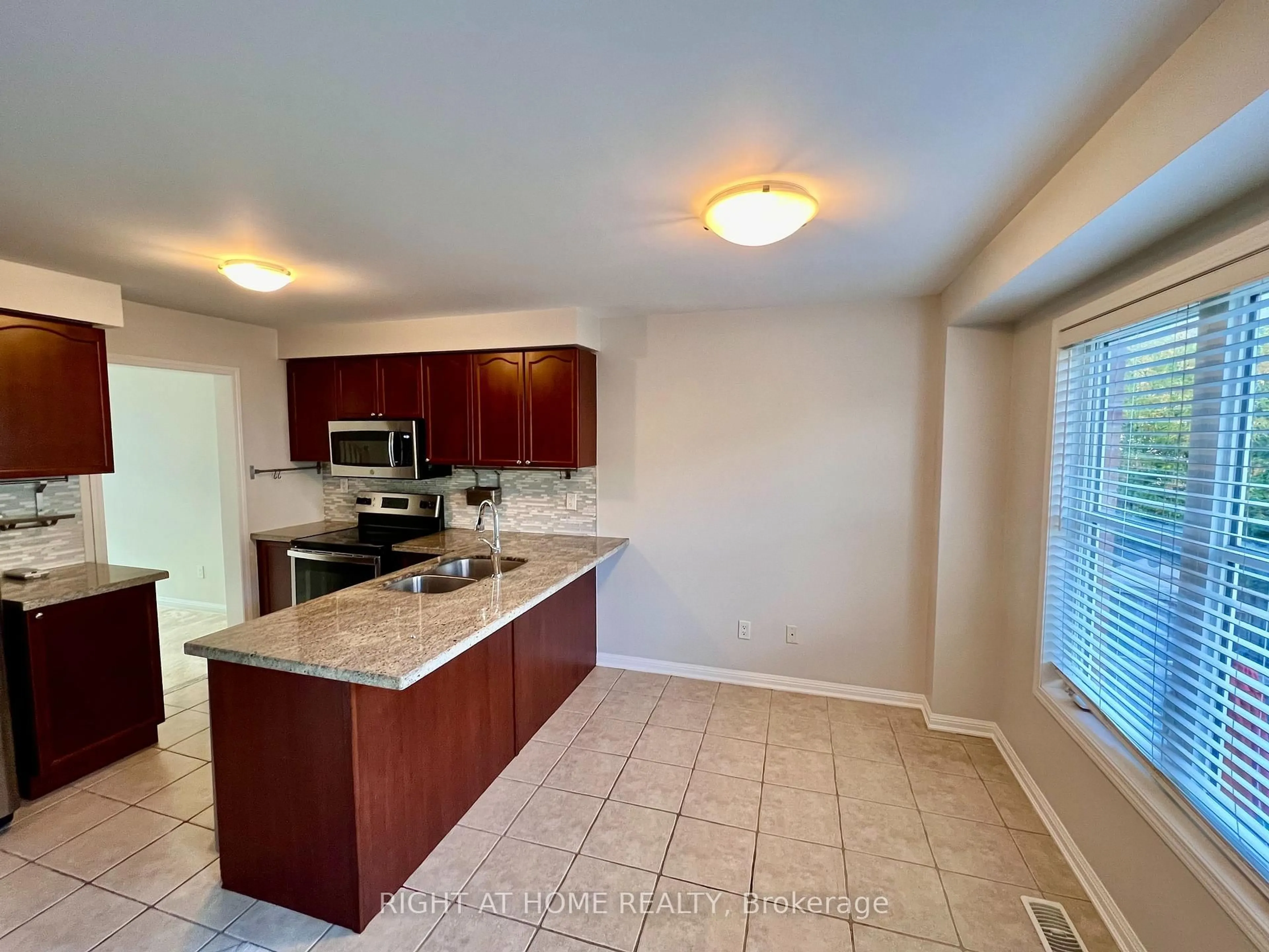 Open concept kitchen, ceramic/tile floor for 2385 COHO Way, Oakville Ontario L6M 0G6