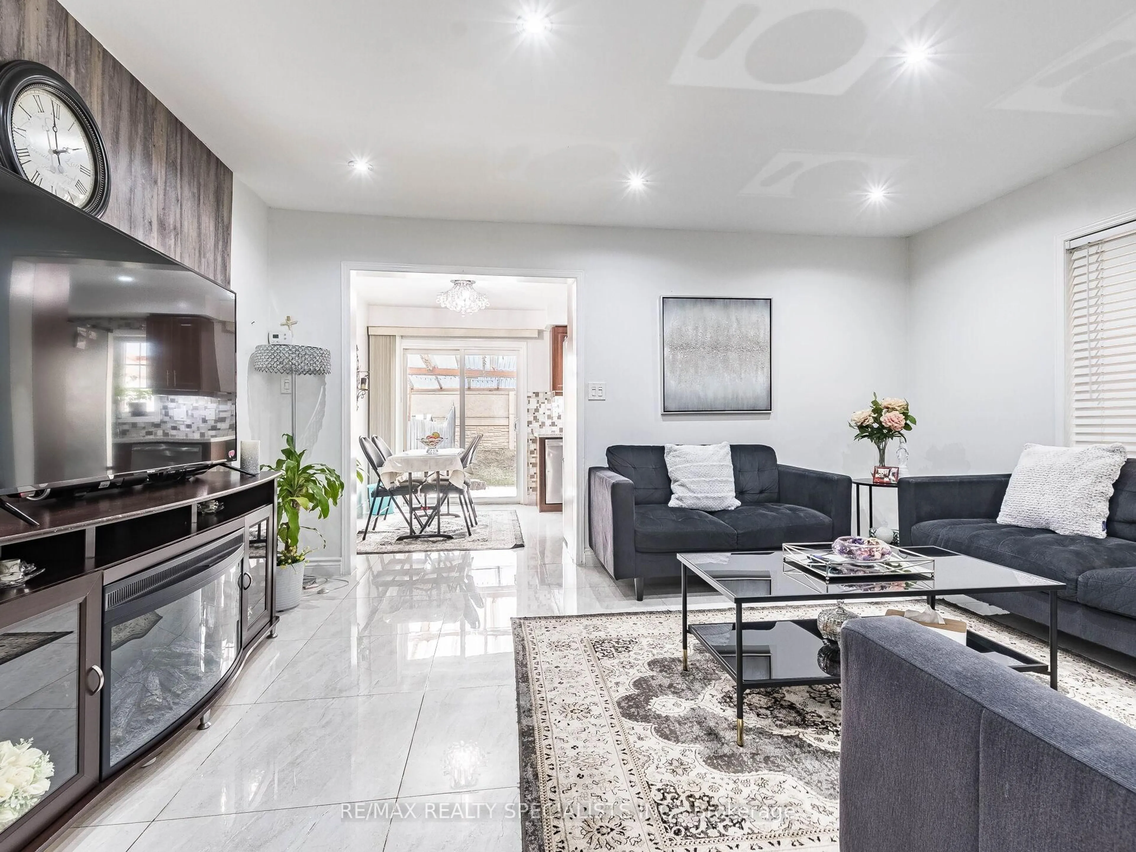 Living room with furniture, unknown for 73 Zia Dodda Cres, Brampton Ontario L6P 1J6