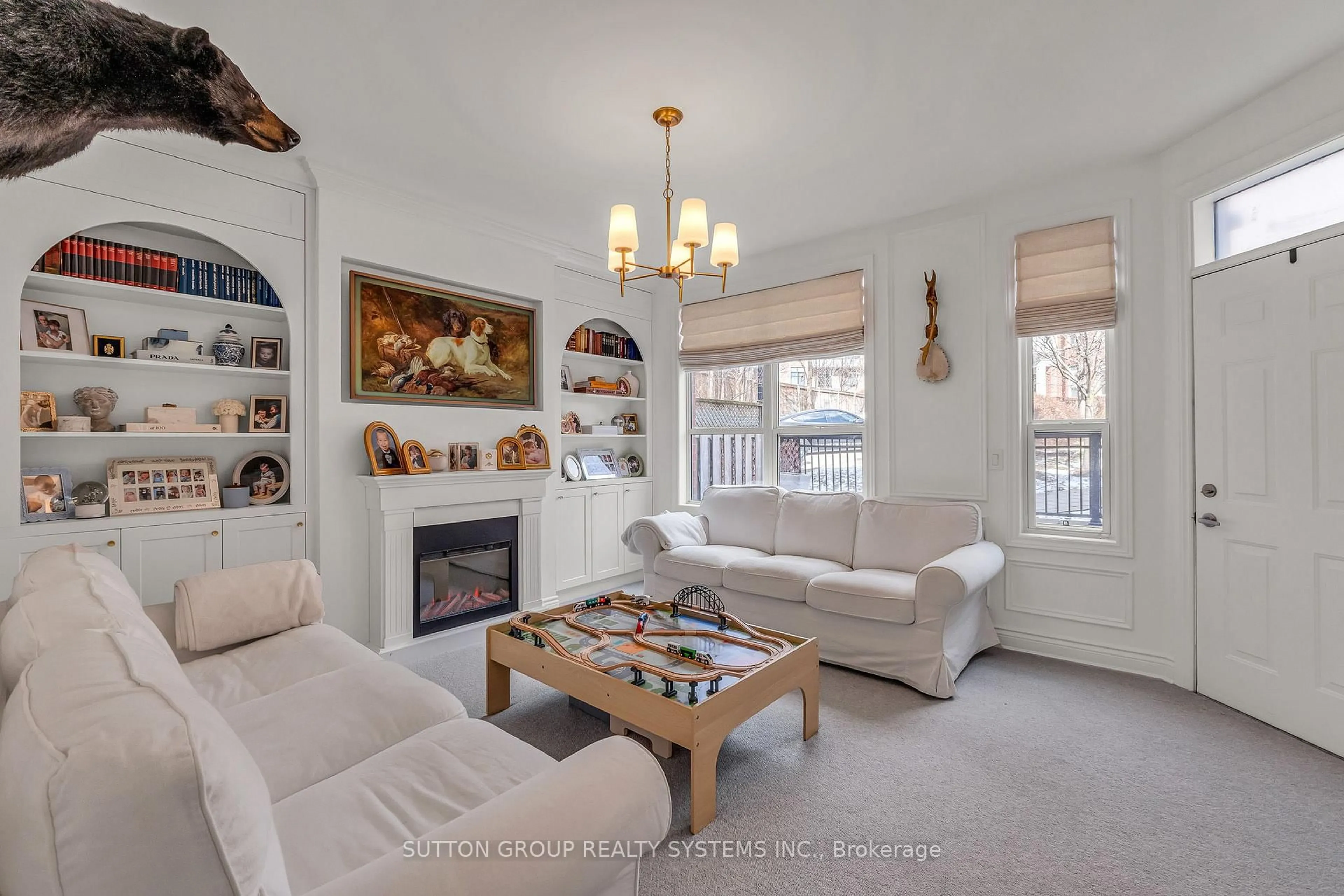 Living room with furniture, unknown for 70 Resurrection Rd, Toronto Ontario M9A 5H1