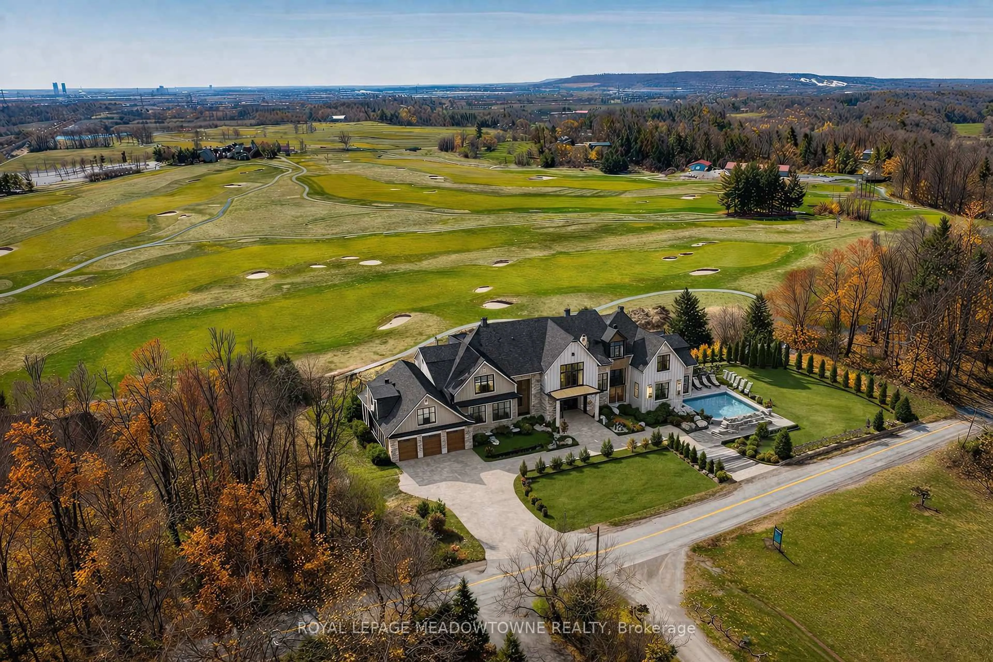 A pic from outside/outdoor area/front of a property/back of a property/a pic from drone, mountain view for 8220 10 Sdrd, Halton Hills Ontario L9T 2X7