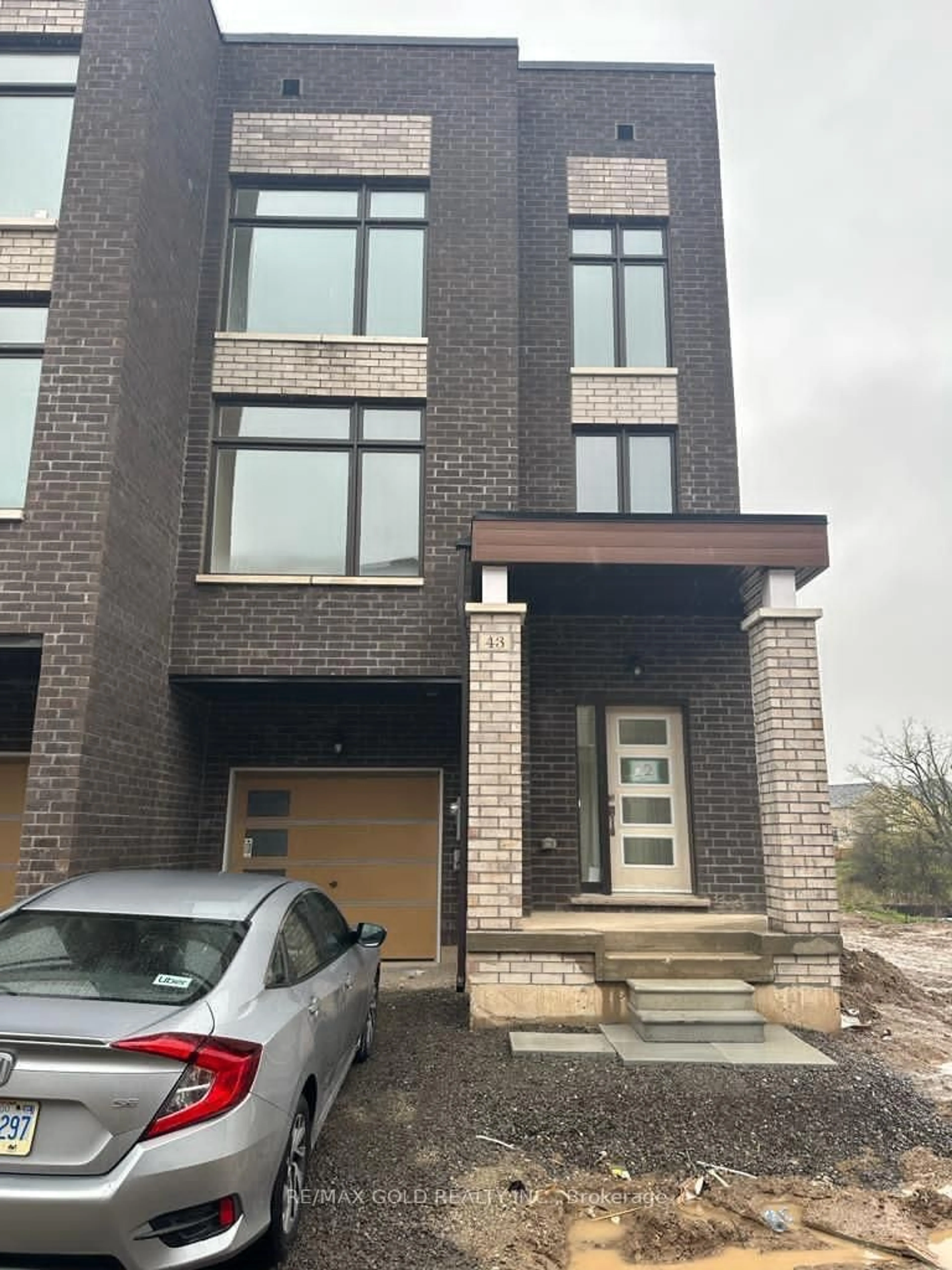 Home with brick exterior material, street for 43 Queenpost Dr, Brampton Ontario L6Y 6L2