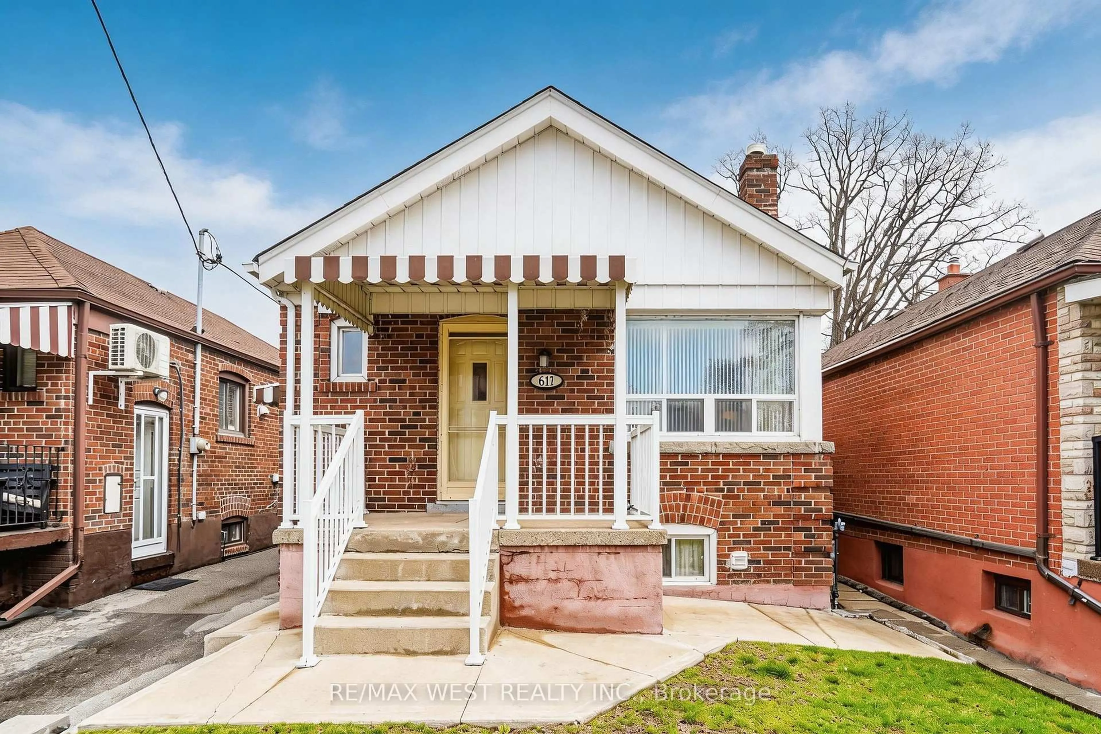 Home with brick exterior material, street for 617 Caledonia Rd, Toronto Ontario M6E 4V7