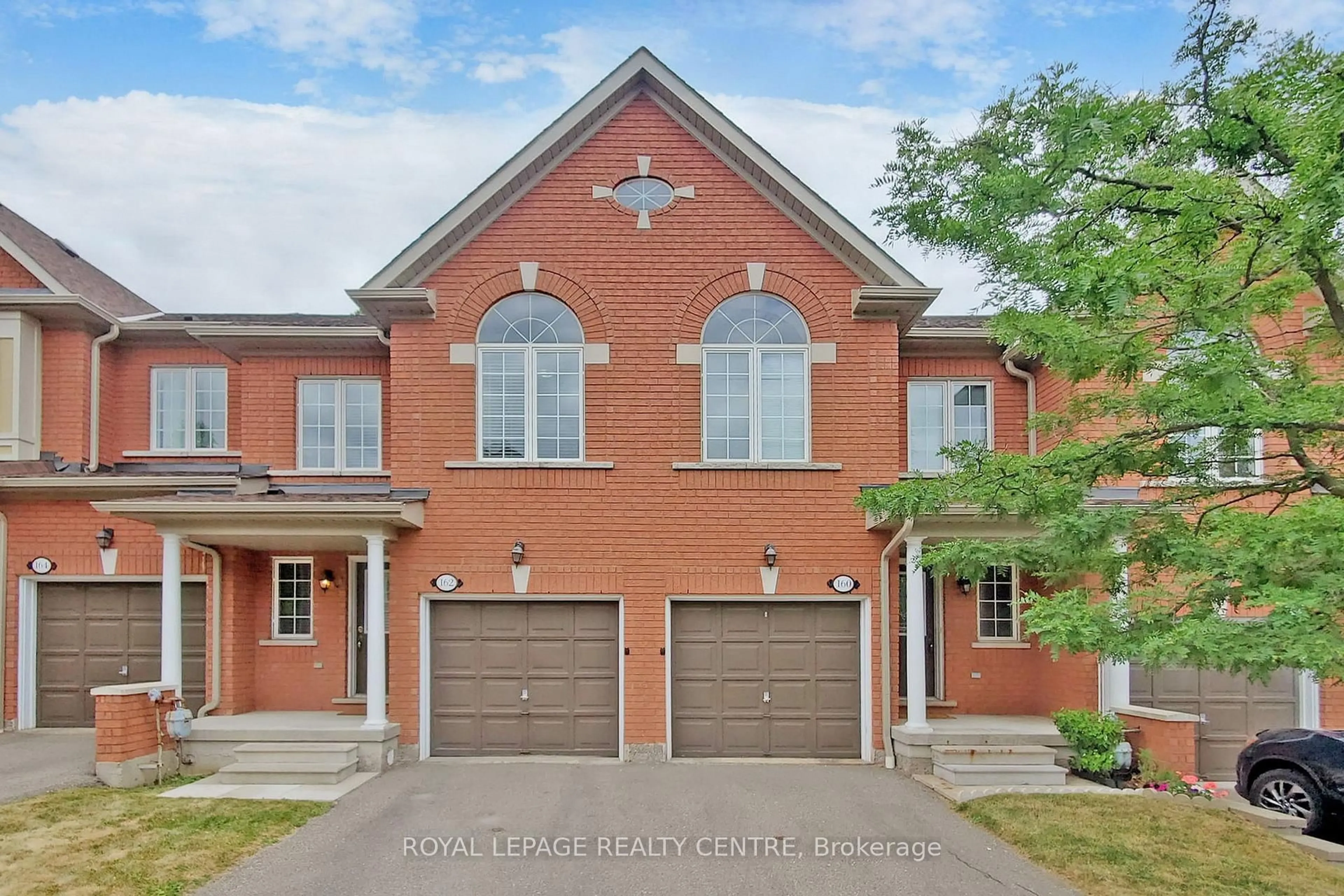Home with brick exterior material, street for 7360 Zinnia Pl #162, Mississauga Ontario L5W 2A1