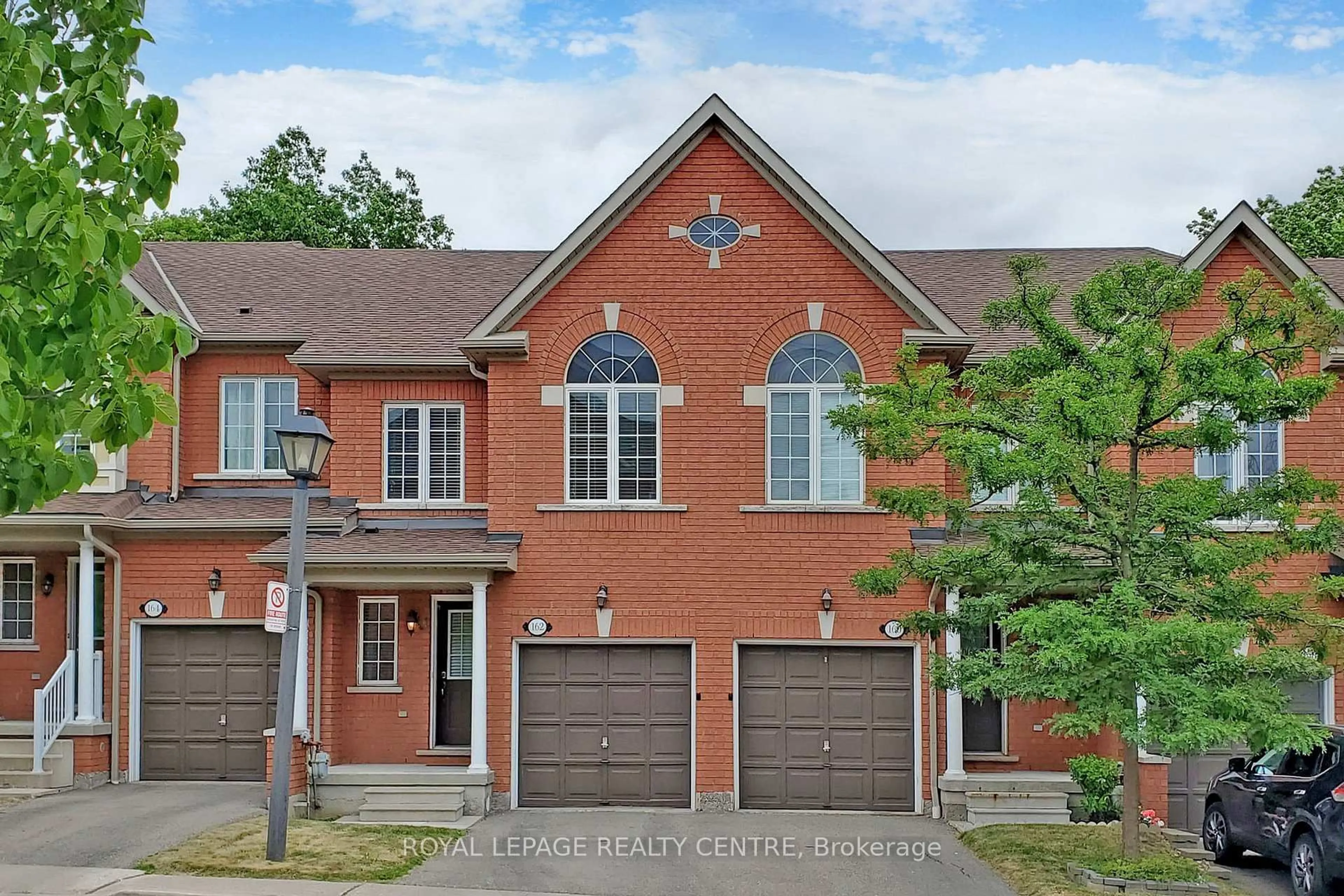 Home with brick exterior material, street for 7360 Zinnia Pl #162, Mississauga Ontario L5W 2A1