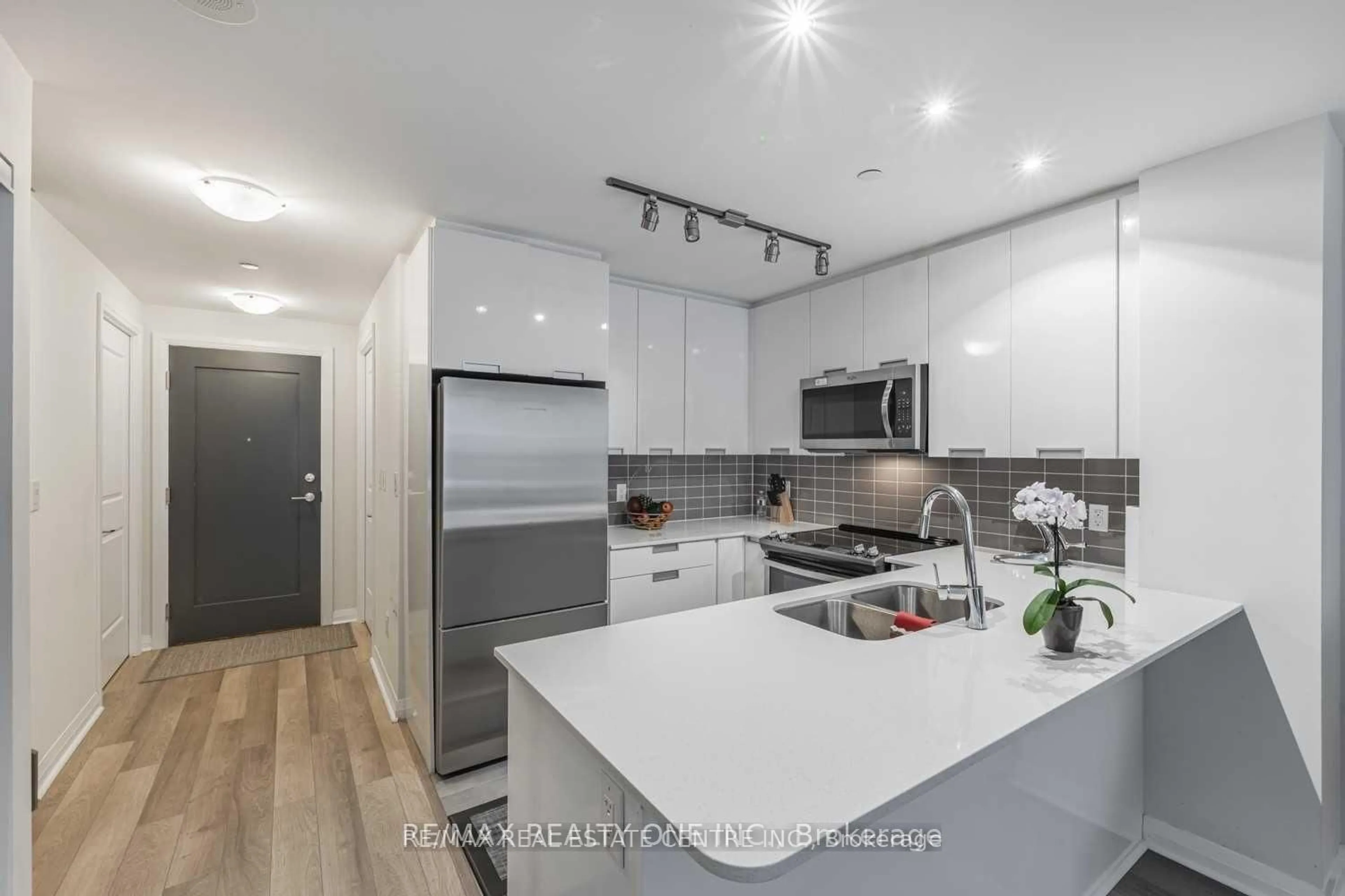 Open concept kitchen, unknown for 5025 Four Springs Ave #112, Mississauga Ontario L5R 0G5