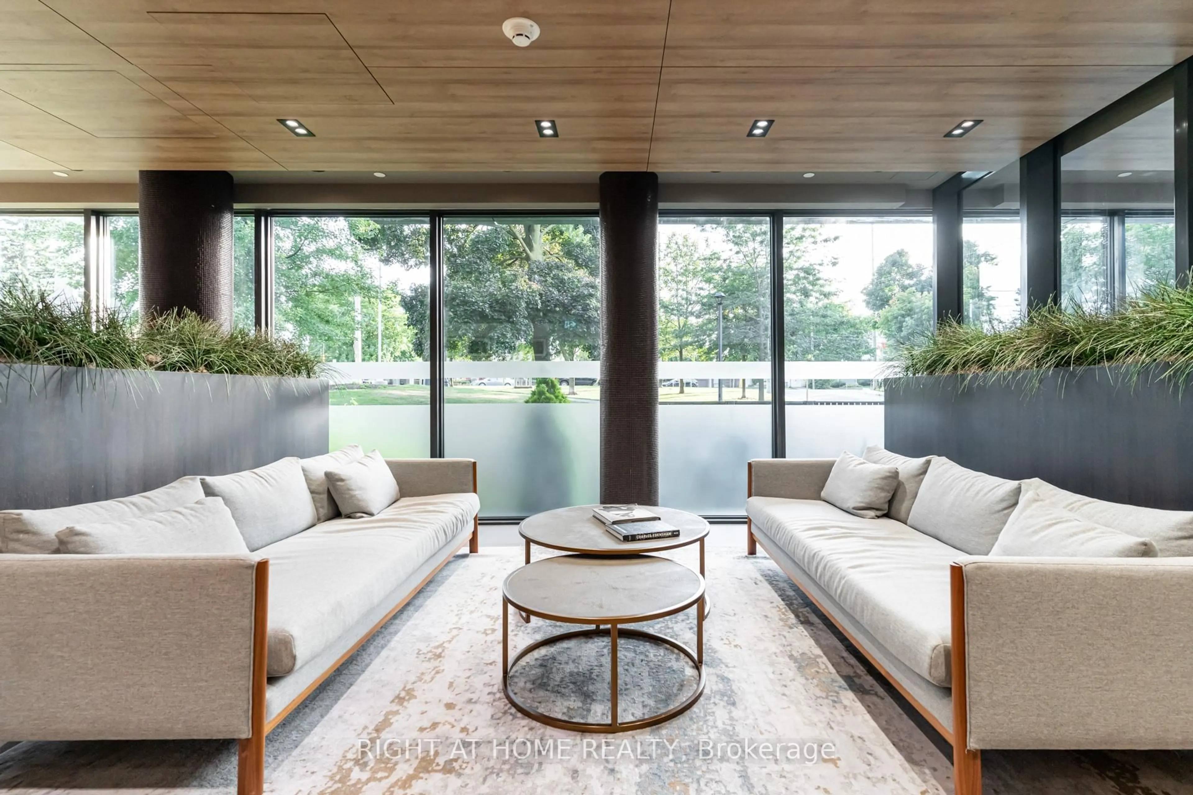 Living room with furniture, cement floor for 21 Park St #506, Mississauga Ontario L5G 0C2