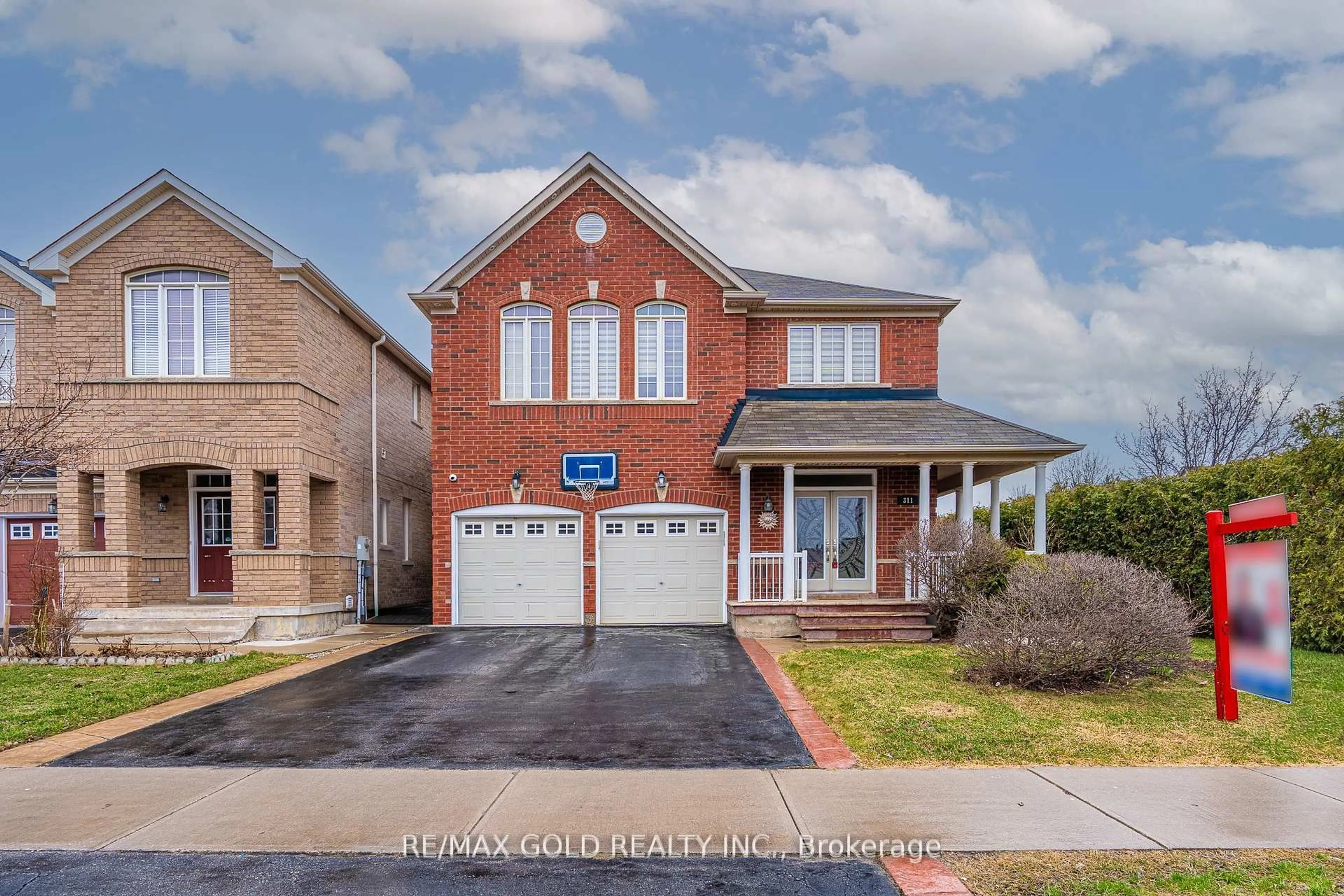 Home with brick exterior material, street for 311 Father Tobin Rd, Brampton Ontario L6R 0P4