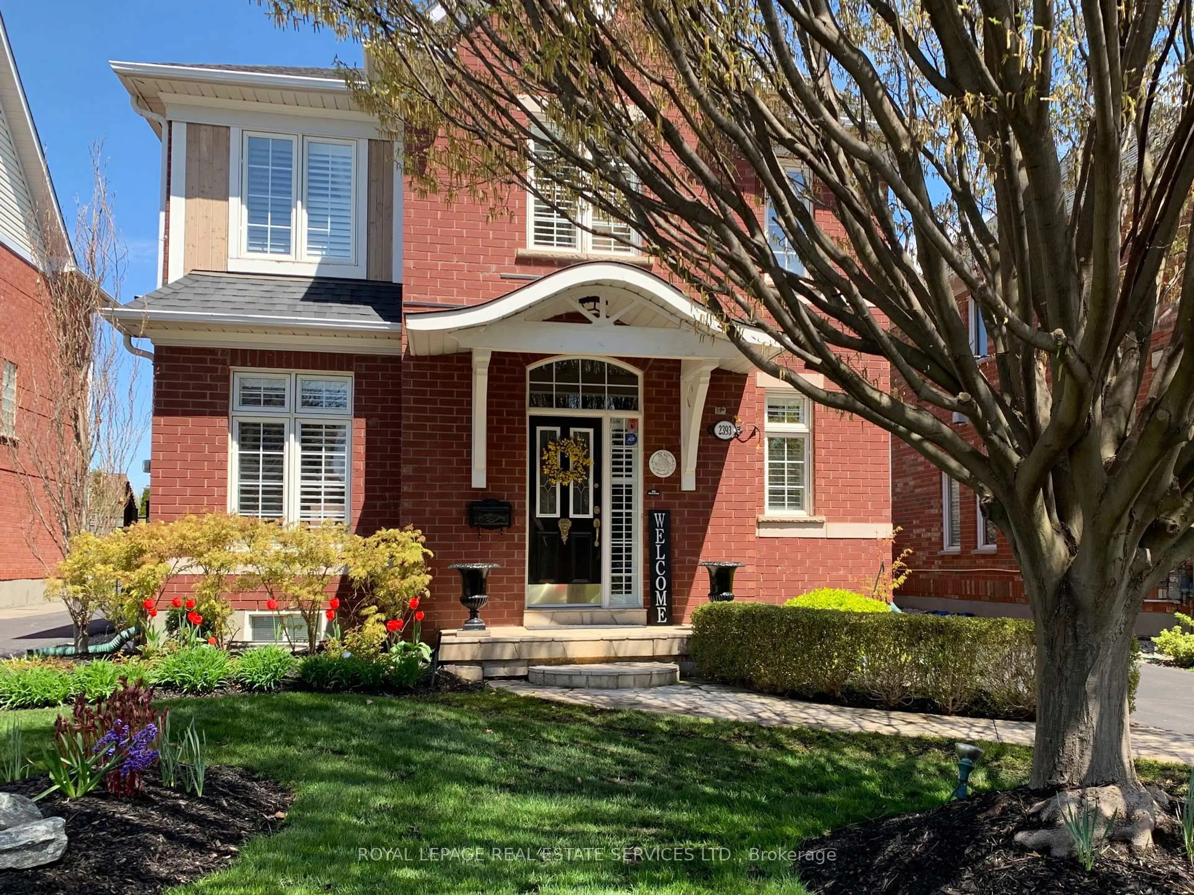 Home with brick exterior material, street for 2393 Ennerdale Rd, Oakville Ontario L6H 6N5