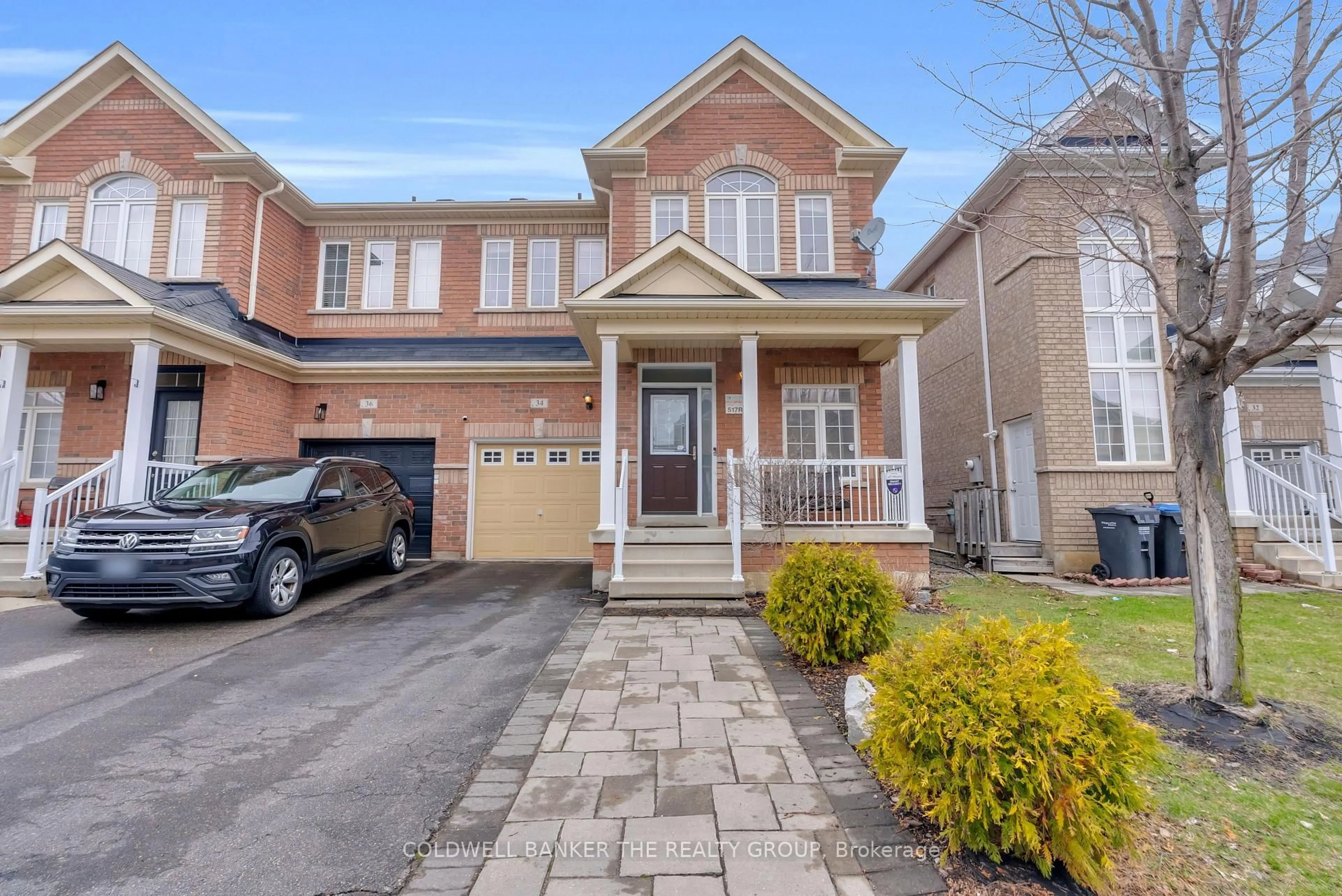 Home with brick exterior material, street for 34 Callalily Rd, Brampton Ontario L7A 0M2