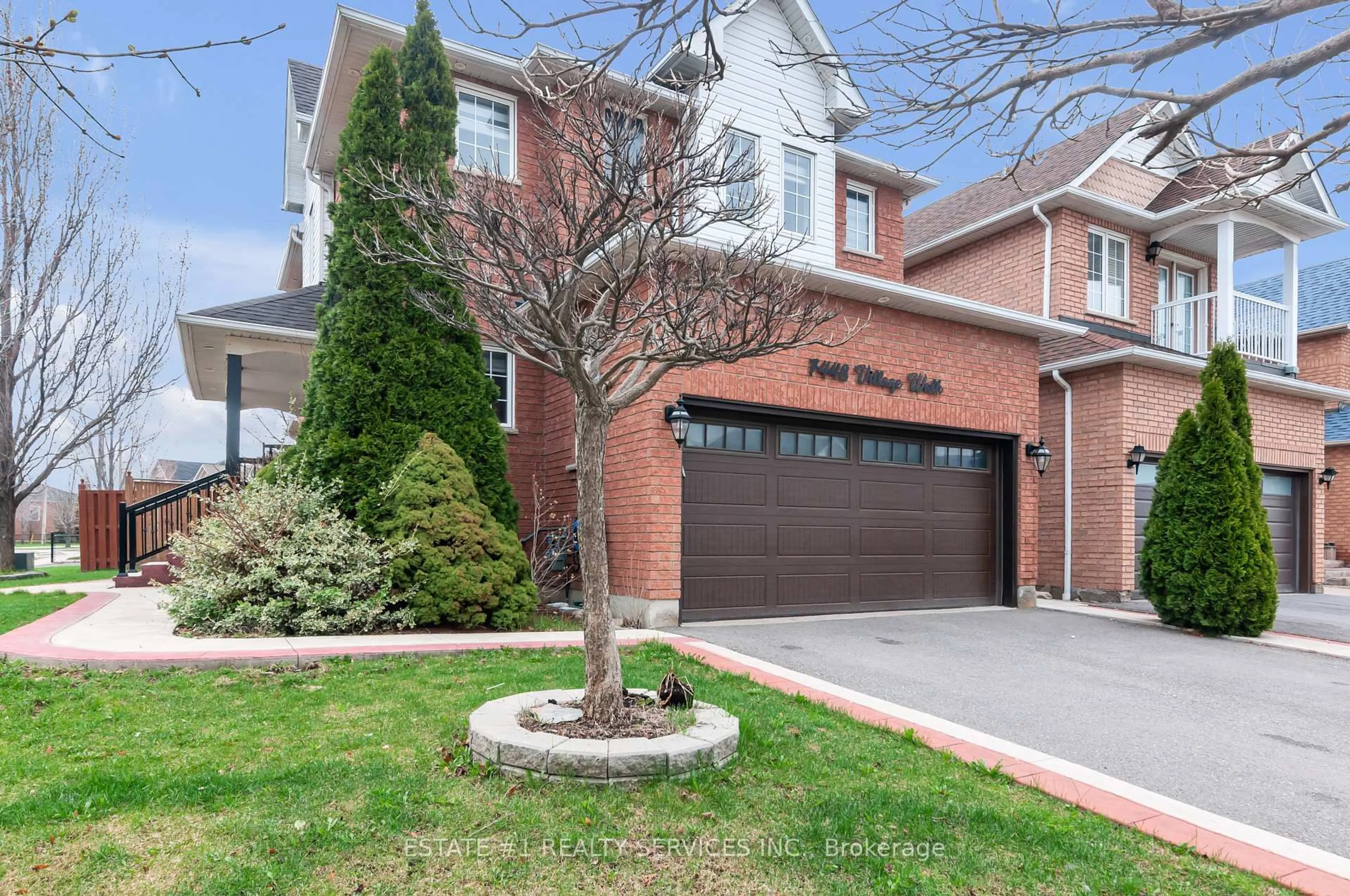 Home with brick exterior material, street for 7448 Village Walk, Mississauga Ontario L5W 2V7