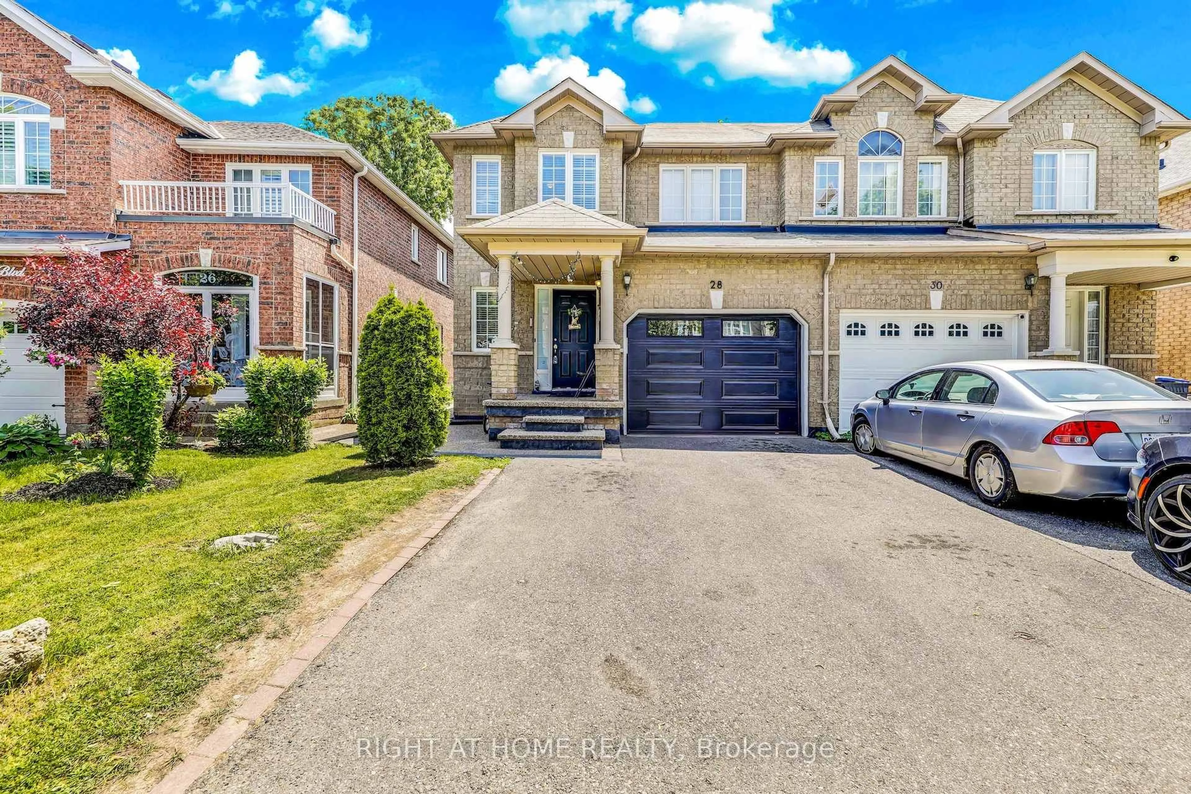 Home with brick exterior material, street for 28 Cedarvalley Blvd, Brampton Ontario L7A 2C2