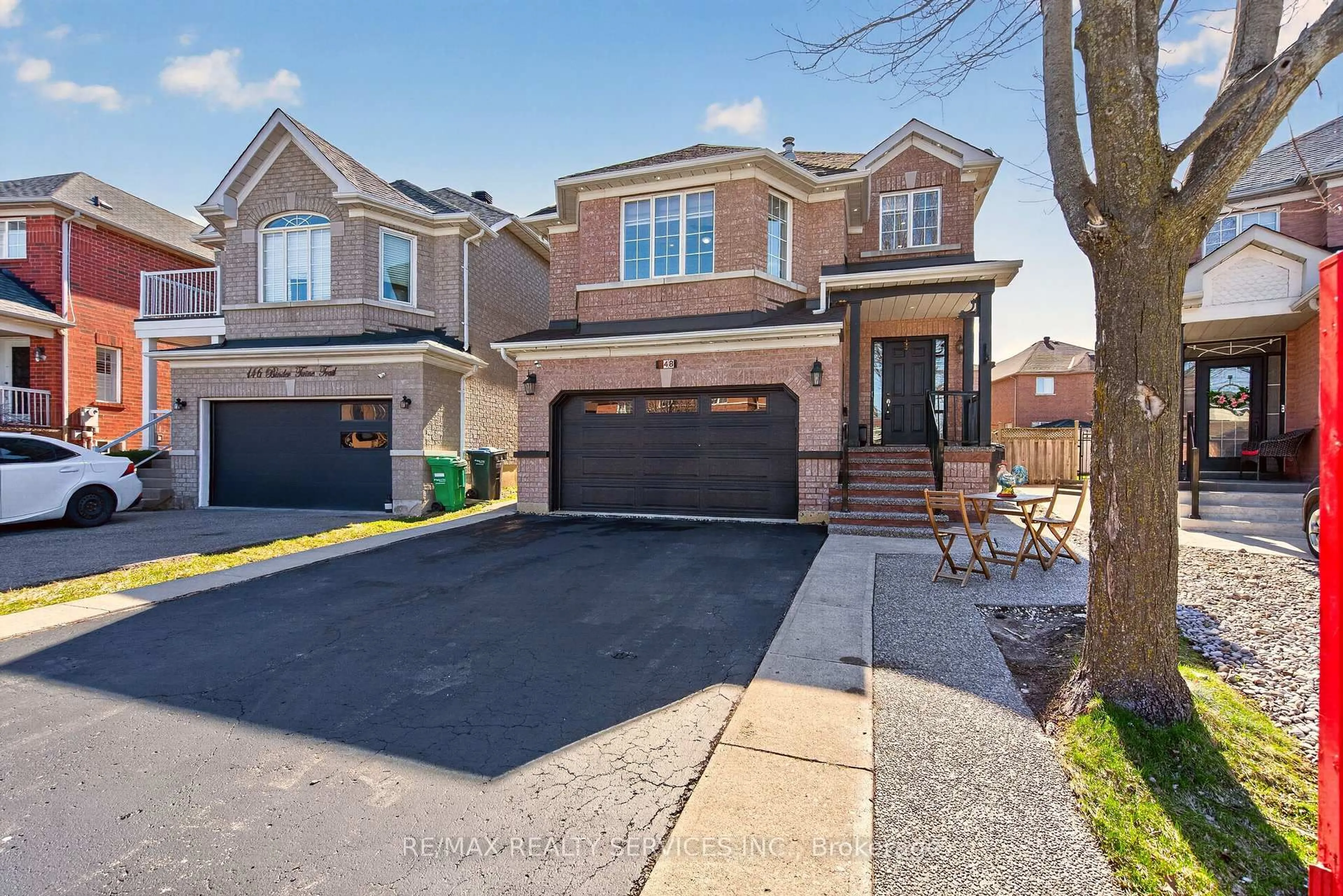 Home with brick exterior material, street for 148 Binder Twine Tr, Brampton Ontario L6X 4V6