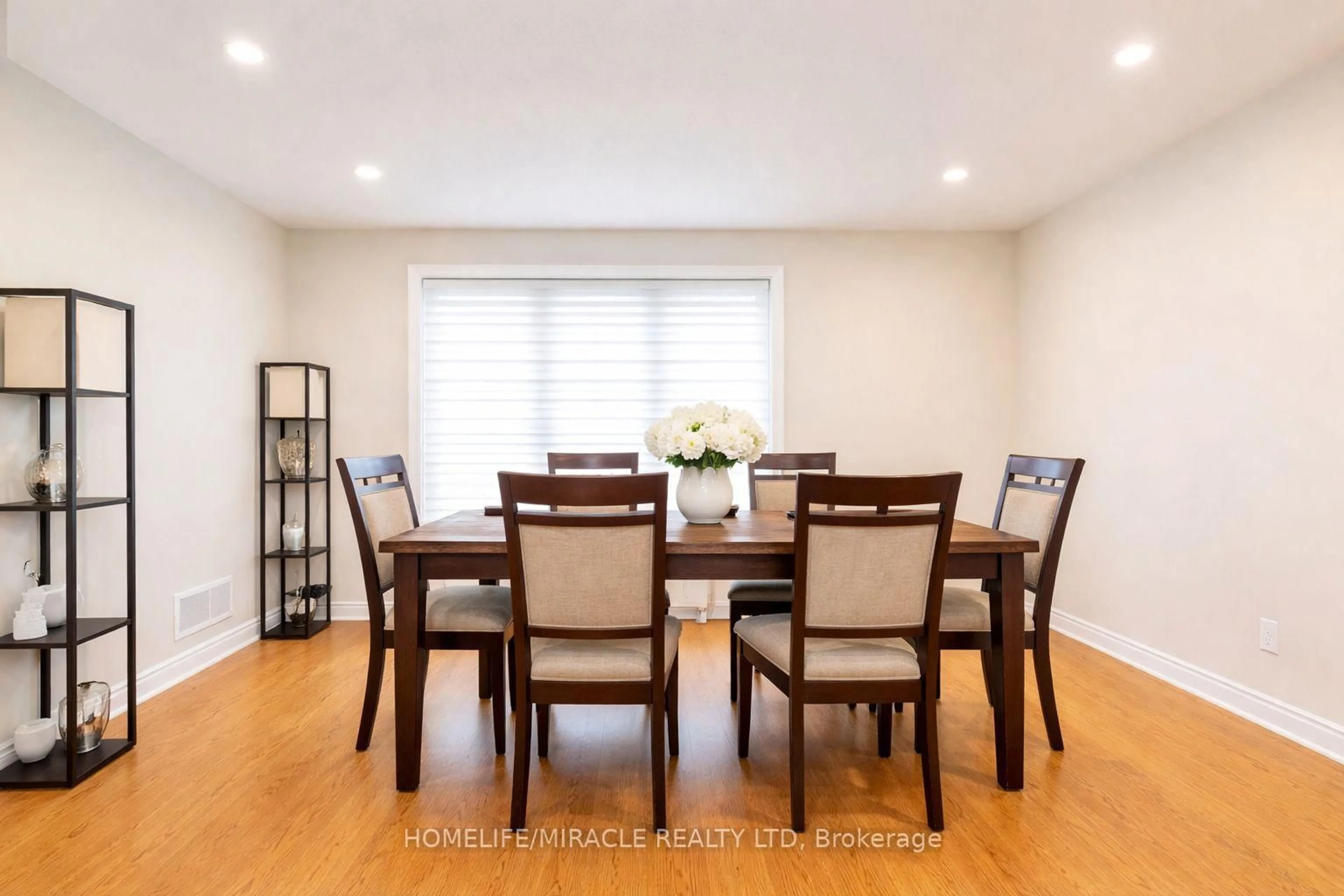 Dining room, wood/laminate floor for 31 Binder Twine Tr, Brampton Ontario L6X 4S5