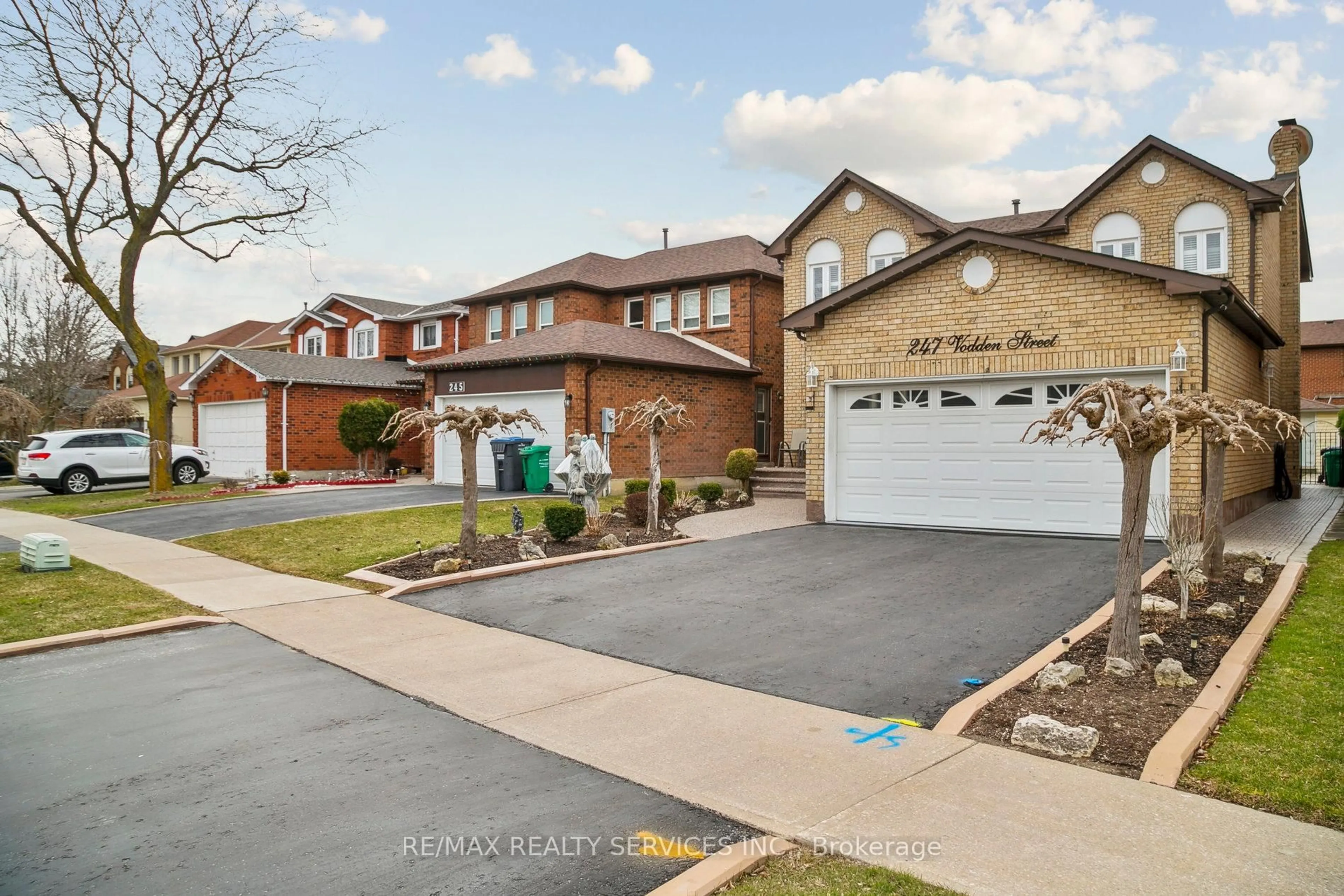 Home with brick exterior material, street for 247 Vodden St, Brampton Ontario L6X 2X7