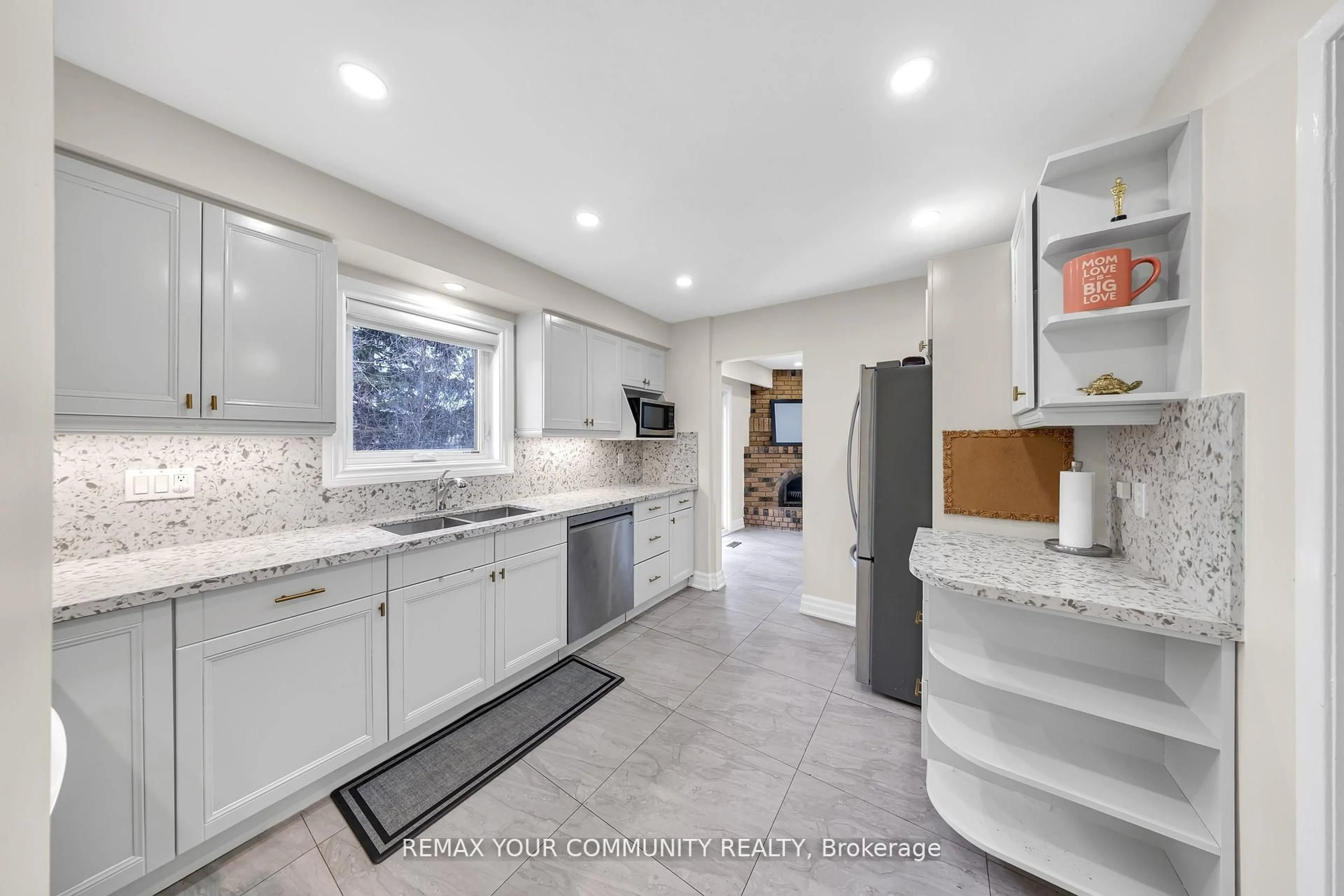 Open concept kitchen, ceramic/tile floor for 22 MADELAINE Cres, Brampton Ontario L6S 2Y9