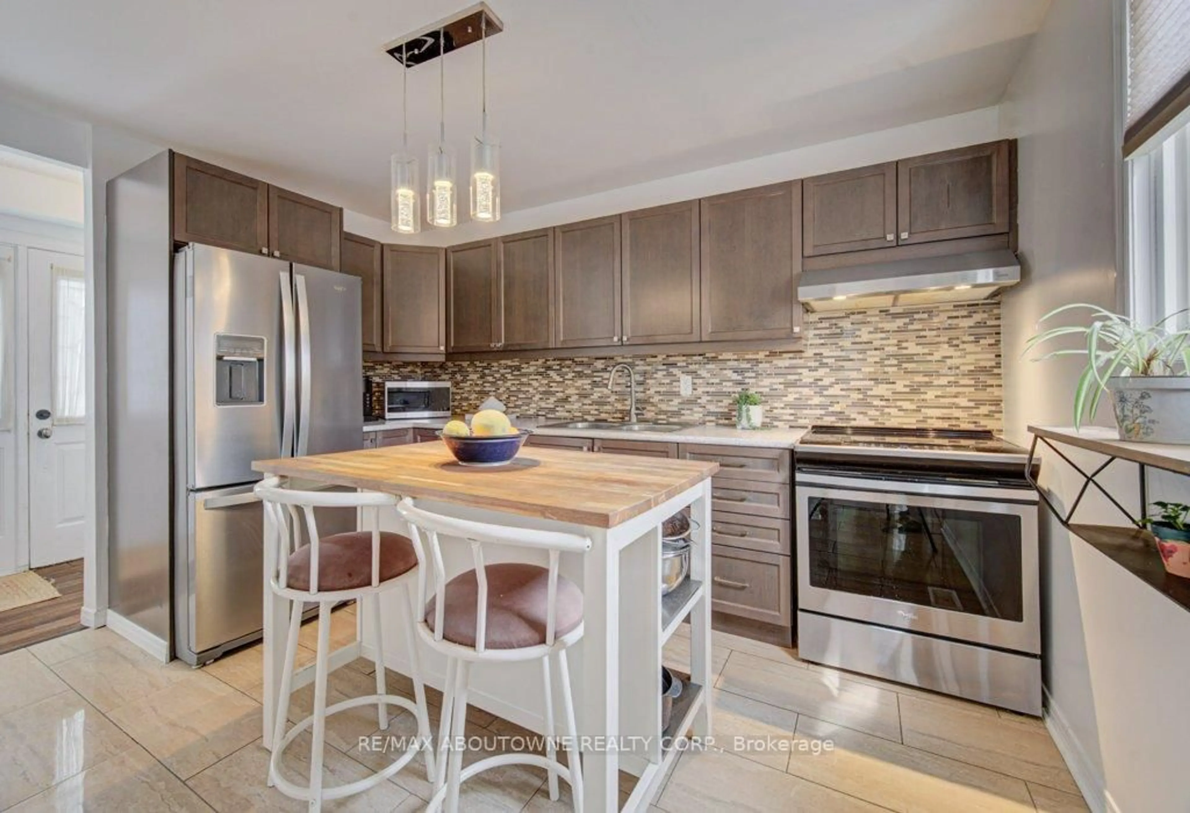 Contemporary kitchen, ceramic/tile floor for 85 Huntingwood Cres, Brampton Ontario L6S 1S5