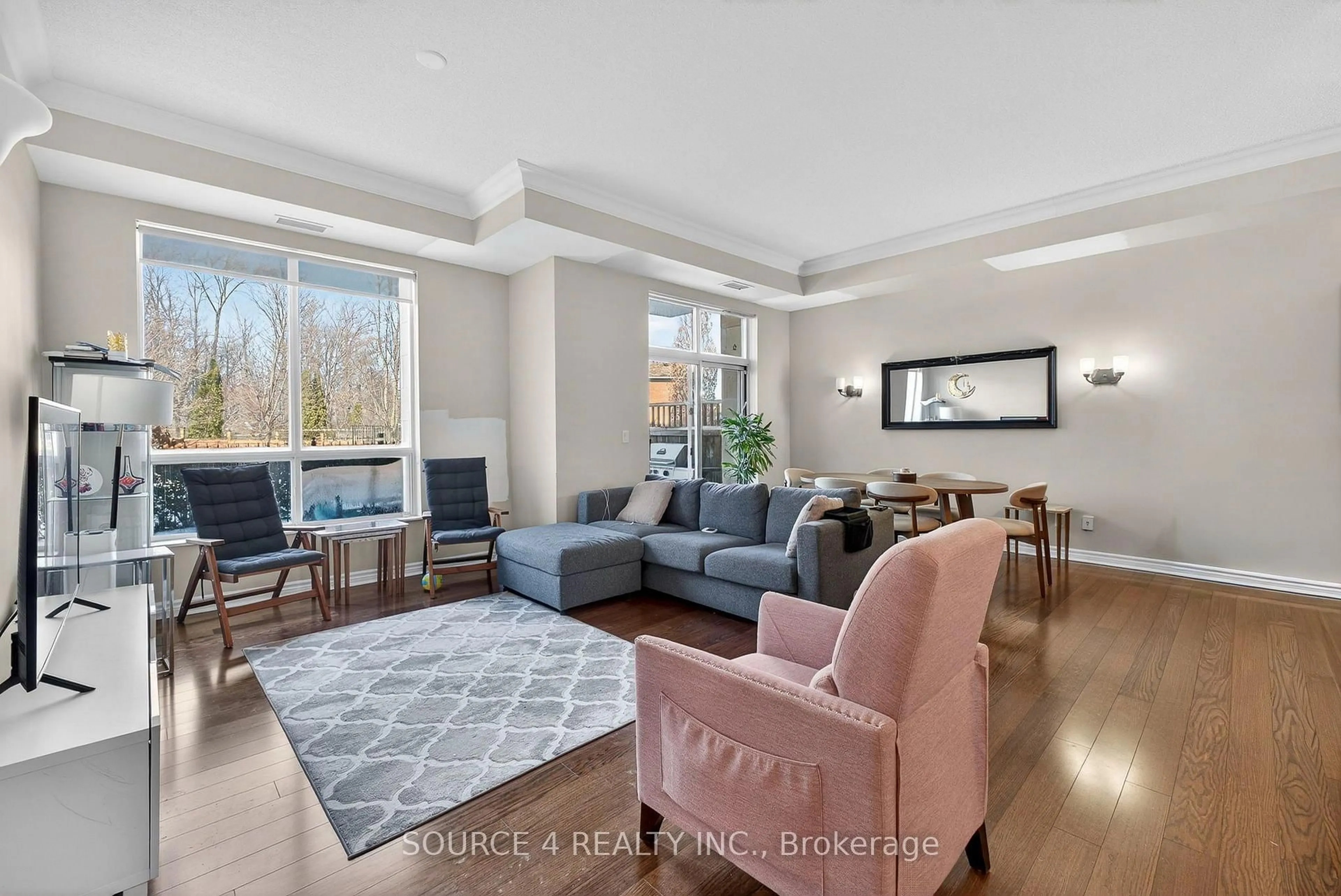 Living room with furniture, unknown for 483 Faith Dr #105, Mississauga Ontario L5R 0A1