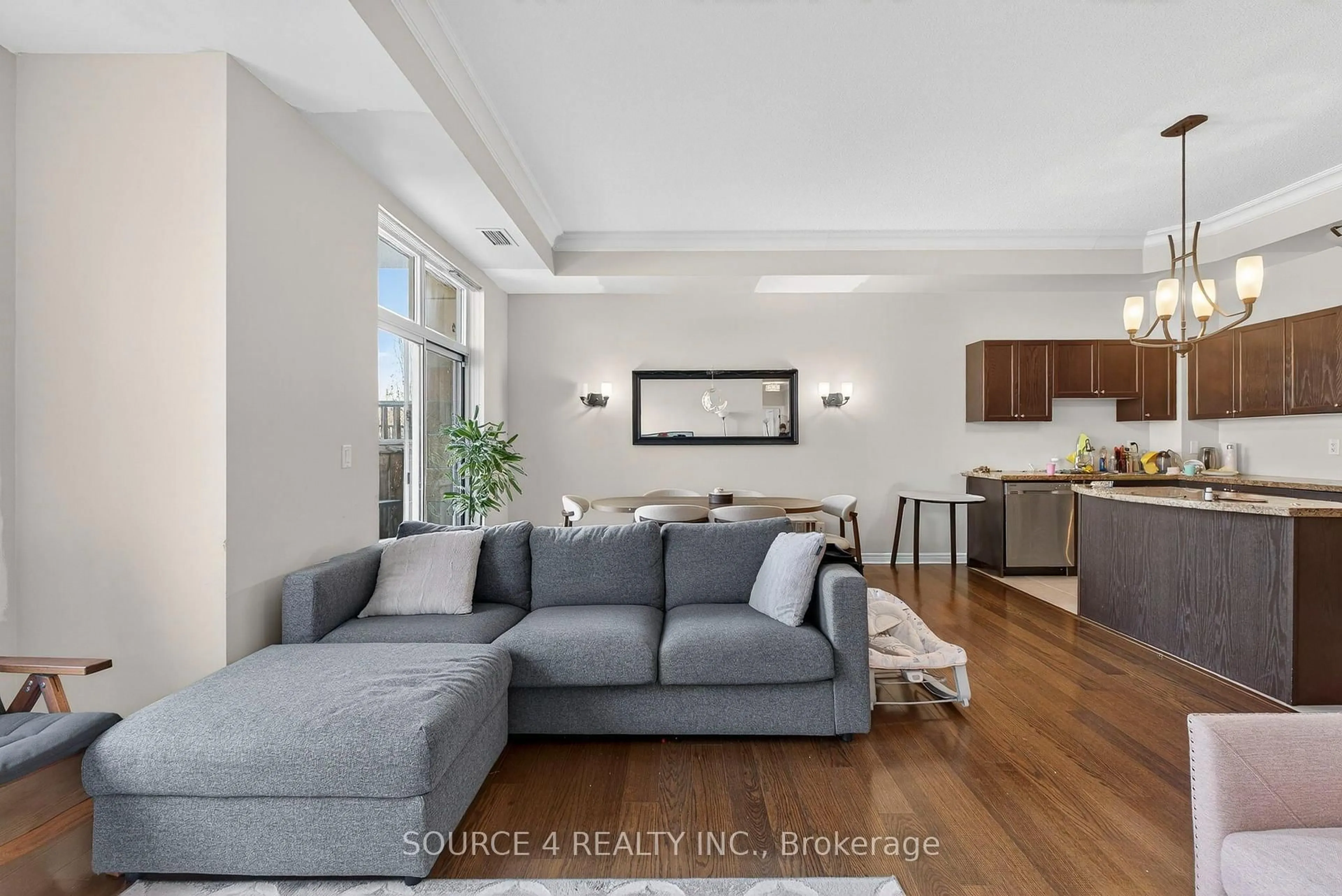 Living room with furniture, unknown for 483 Faith Dr #105, Mississauga Ontario L5R 0A1