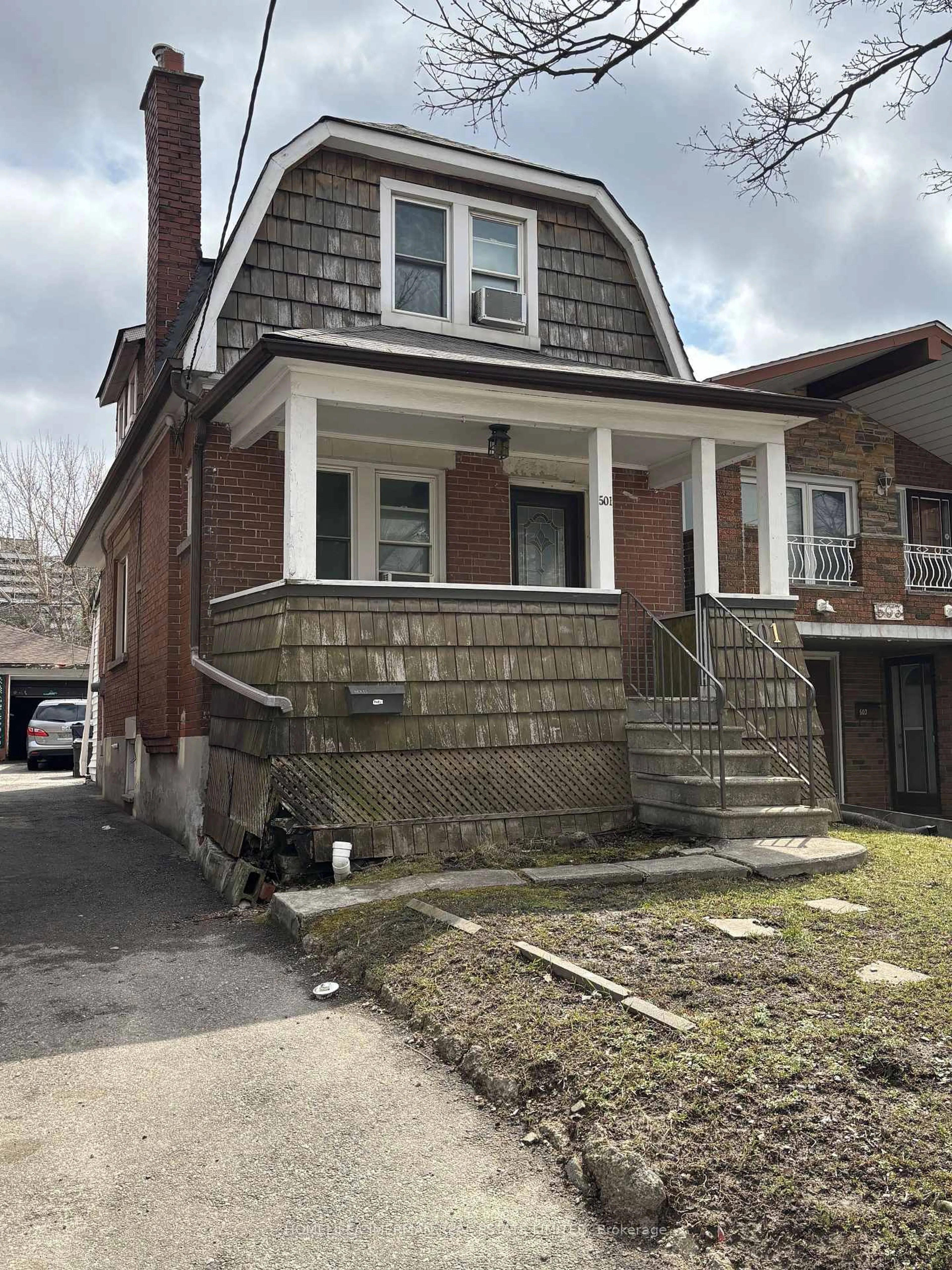 Home with brick exterior material, street for 501 Whitmore Ave, Toronto Ontario M6E 2N9