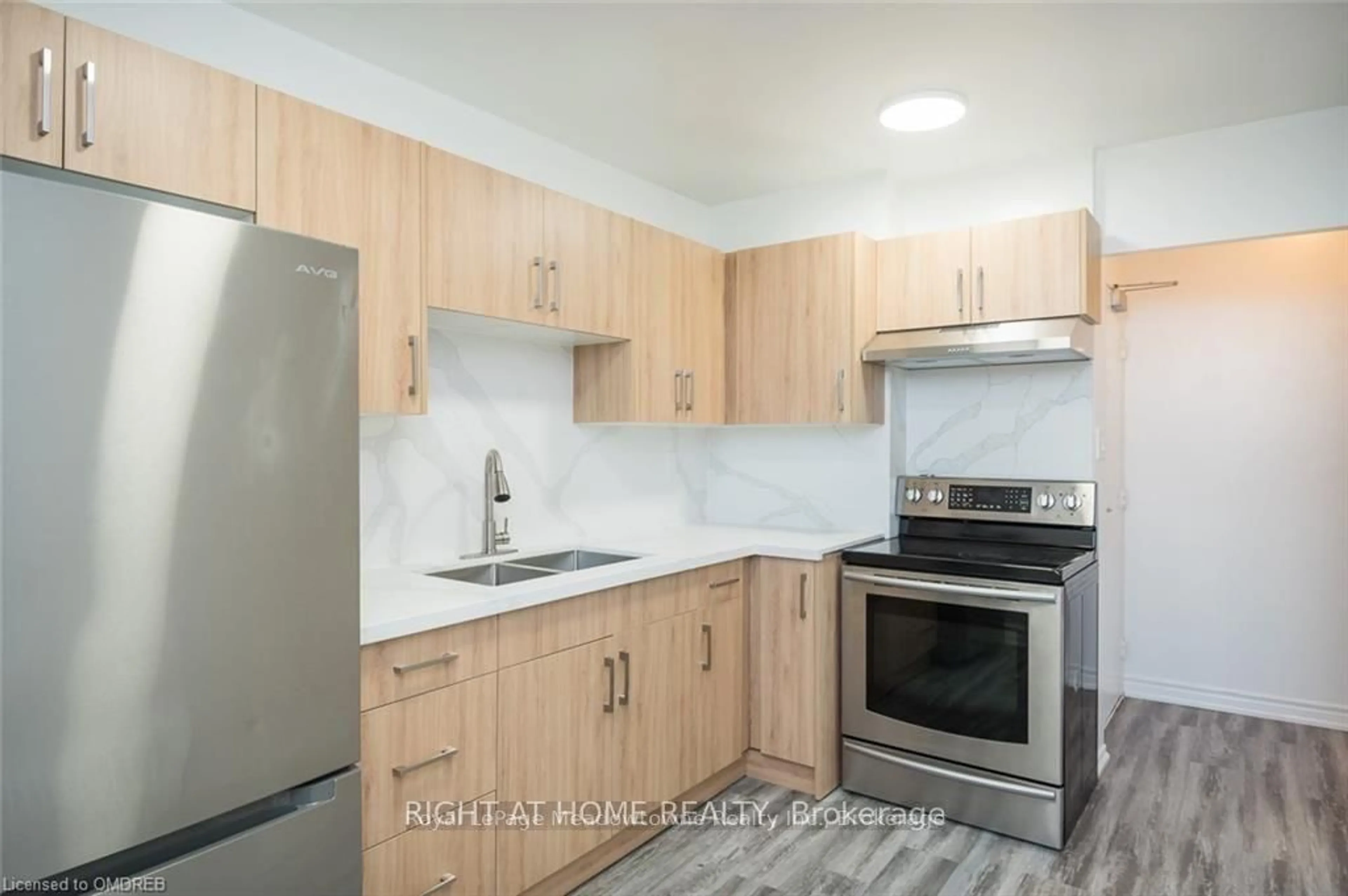 Standard kitchen, wood/laminate floor for 390 Dixon Rd #508, Toronto Ontario M9R 1T4