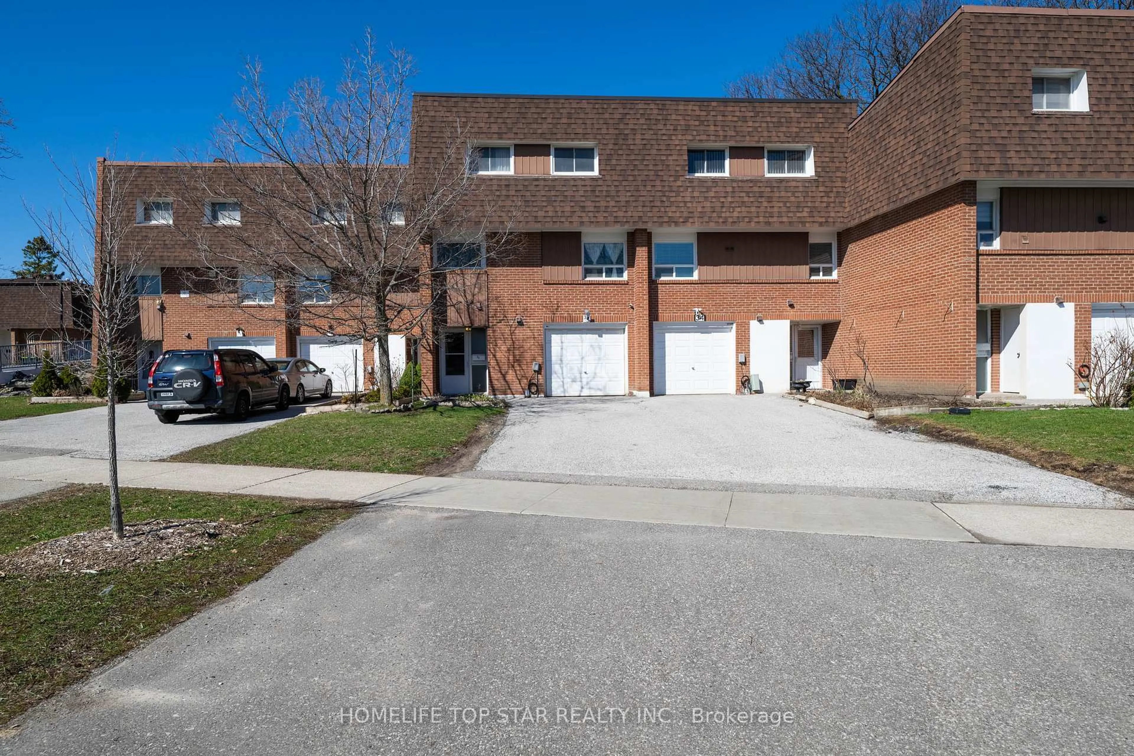 A pic from outside/outdoor area/front of a property/back of a property/a pic from drone, street for 452 Silverstone Dr #33, Toronto Ontario M9V 3K8