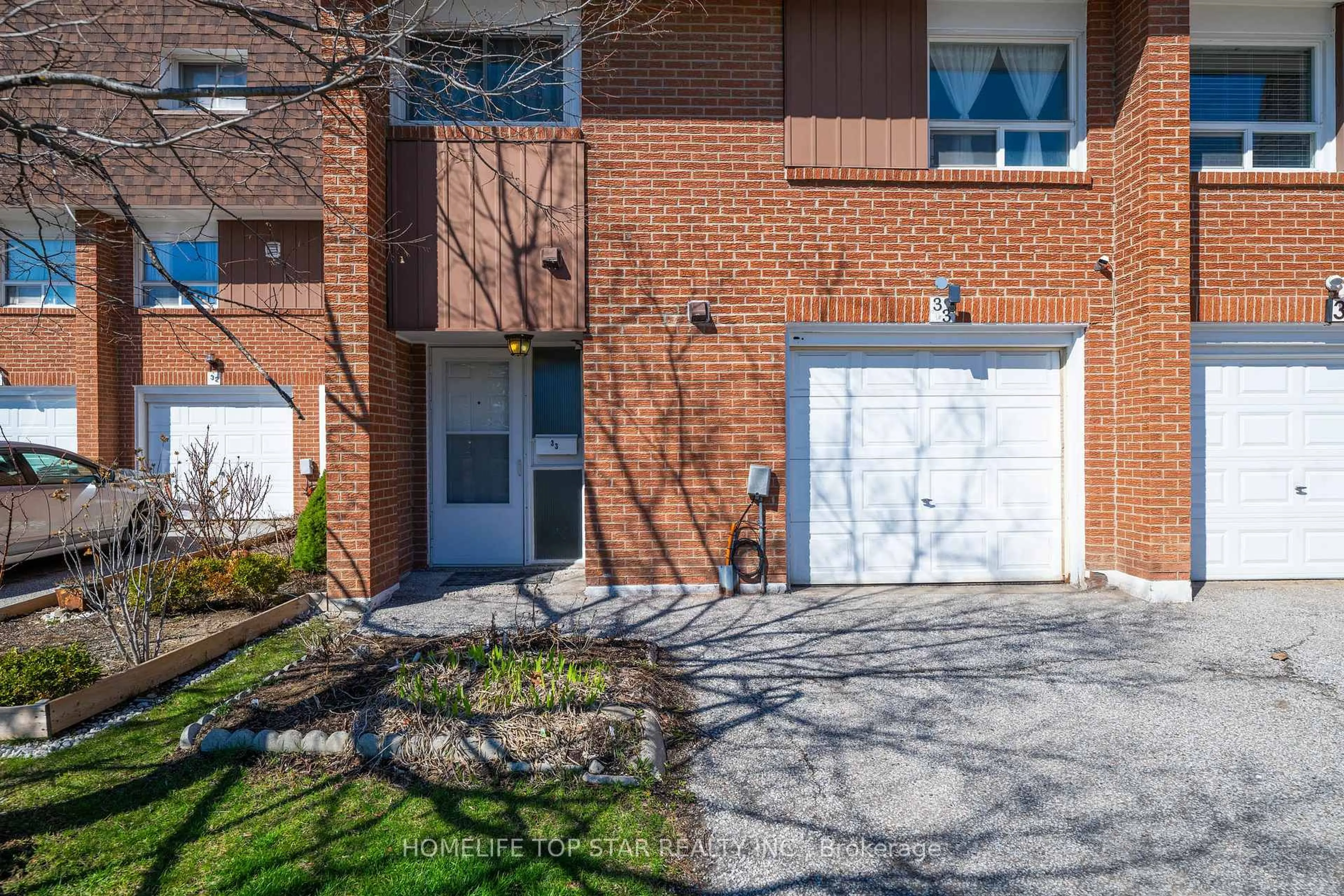 Home with brick exterior material, street for 452 Silverstone Dr #33, Toronto Ontario M9V 3K8