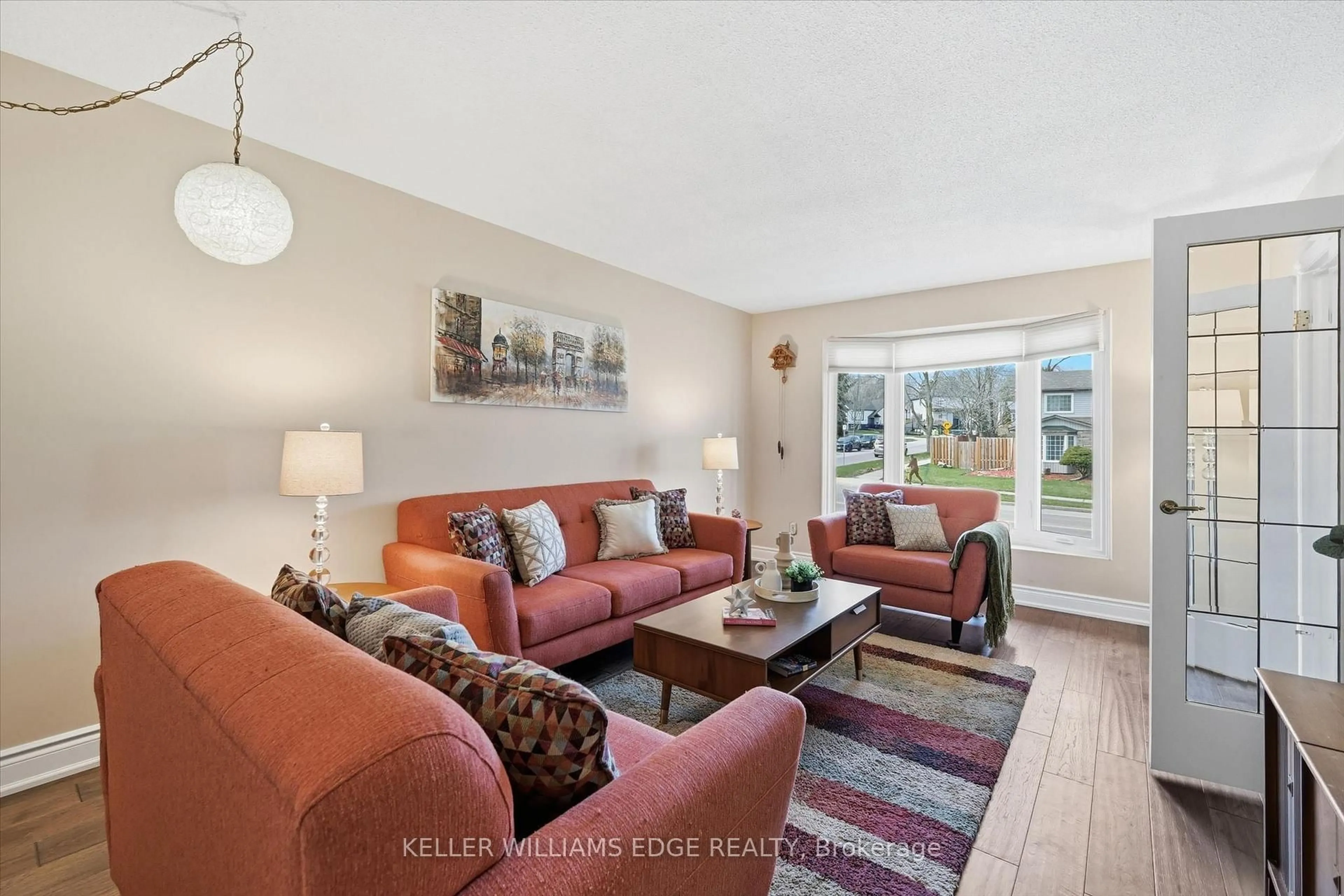 Living room with furniture, ceramic/tile floor for 2648 Cavendish Dr, Burlington Ontario L7P 3V7