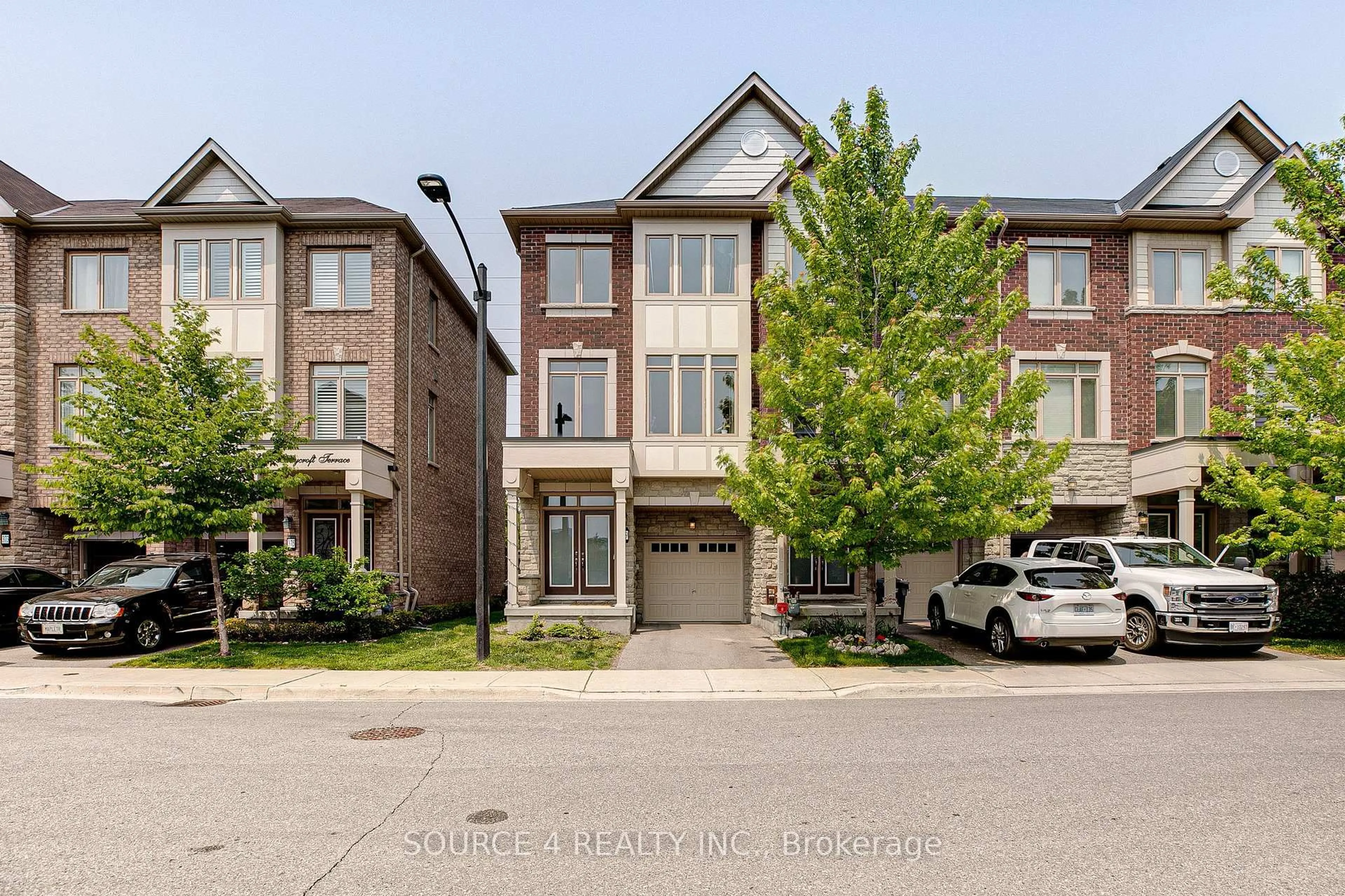 Home with brick exterior material, street for 379 Ladycroft Terr #14, Mississauga Ontario L5A 3N8