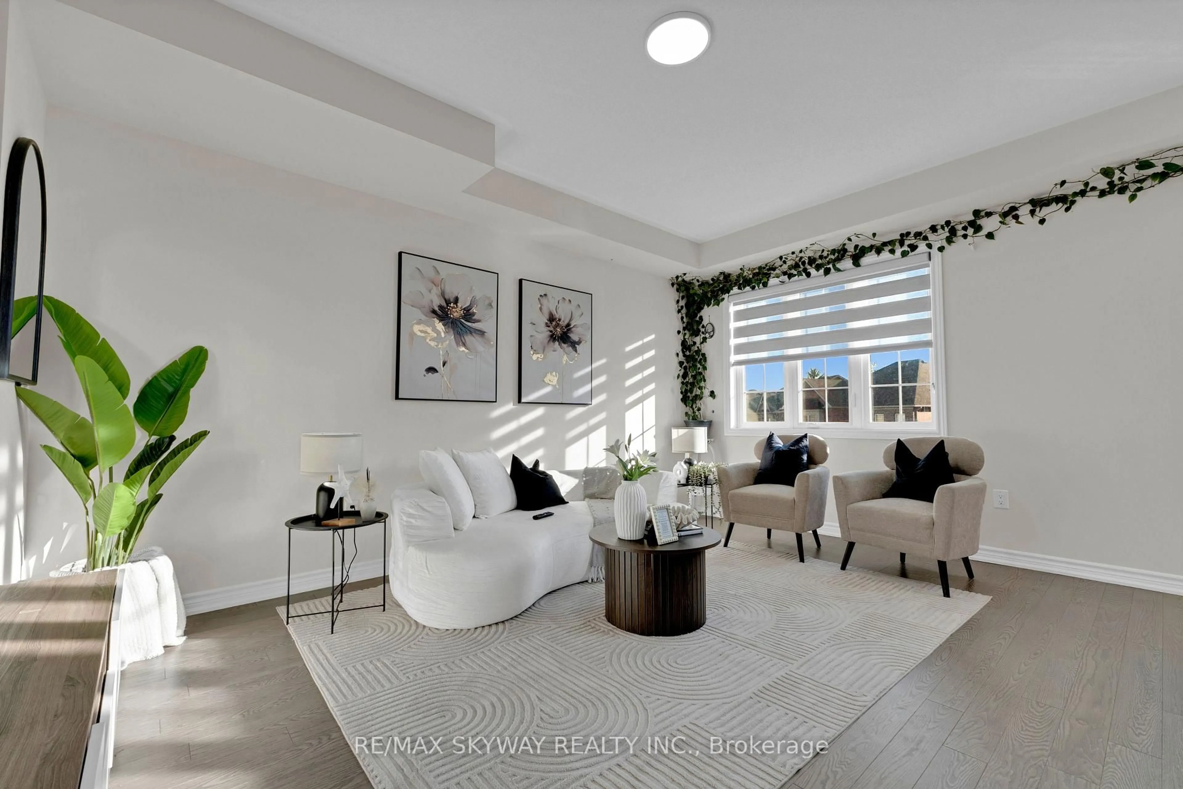 Living room with furniture, ceramic/tile floor for 21 Allegro Dr, Brampton Ontario L6Y 5Y7