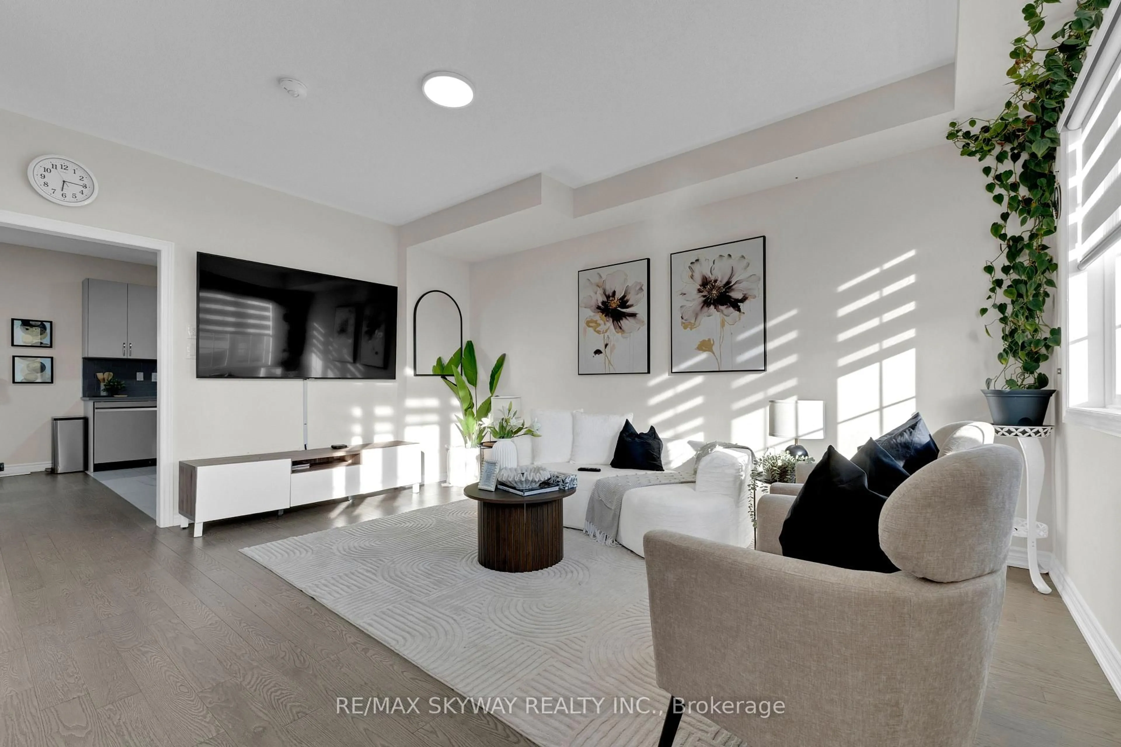 Living room with furniture, ceramic/tile floor for 21 Allegro Dr, Brampton Ontario L6Y 5Y7