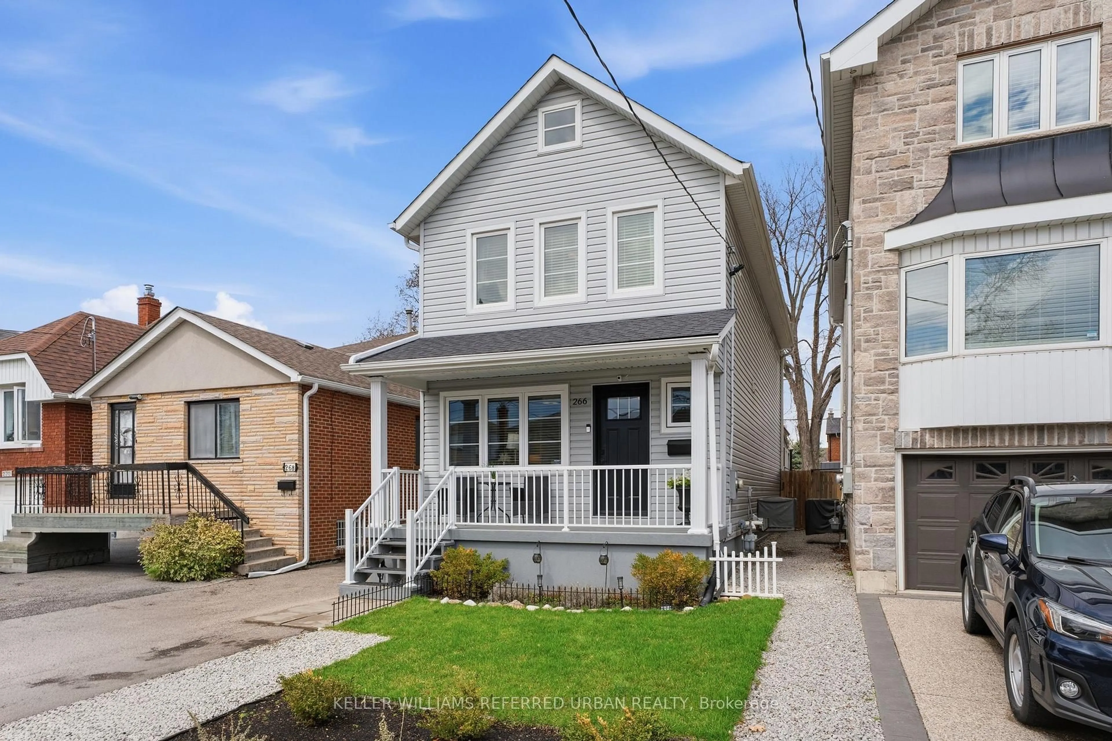 Home with vinyl exterior material, street for 266 Melrose St, Toronto Ontario M8Z 1G6