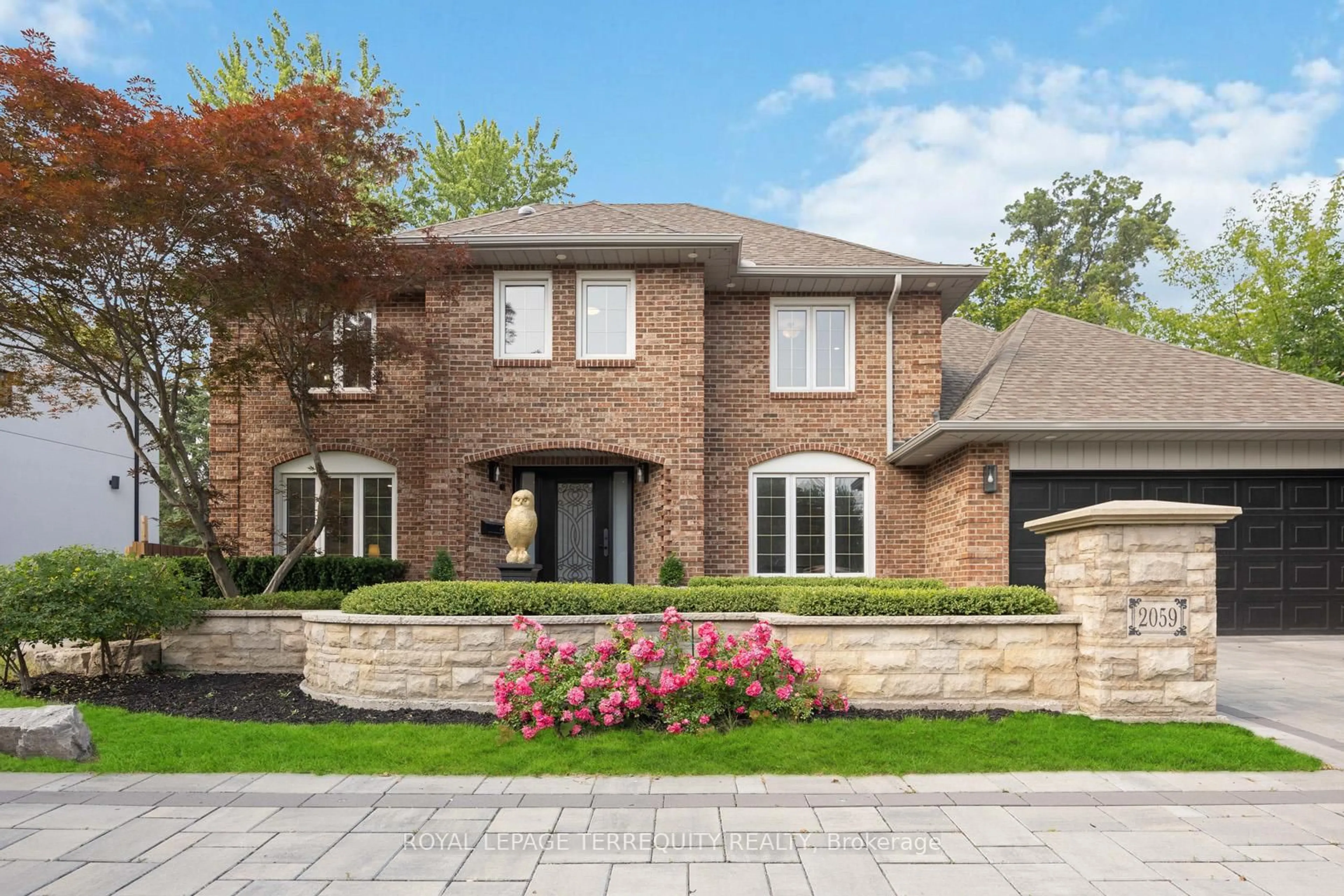 Home with brick exterior material, street for 2059 Shawanaga Tr, Mississauga Ontario L5H 3Z3