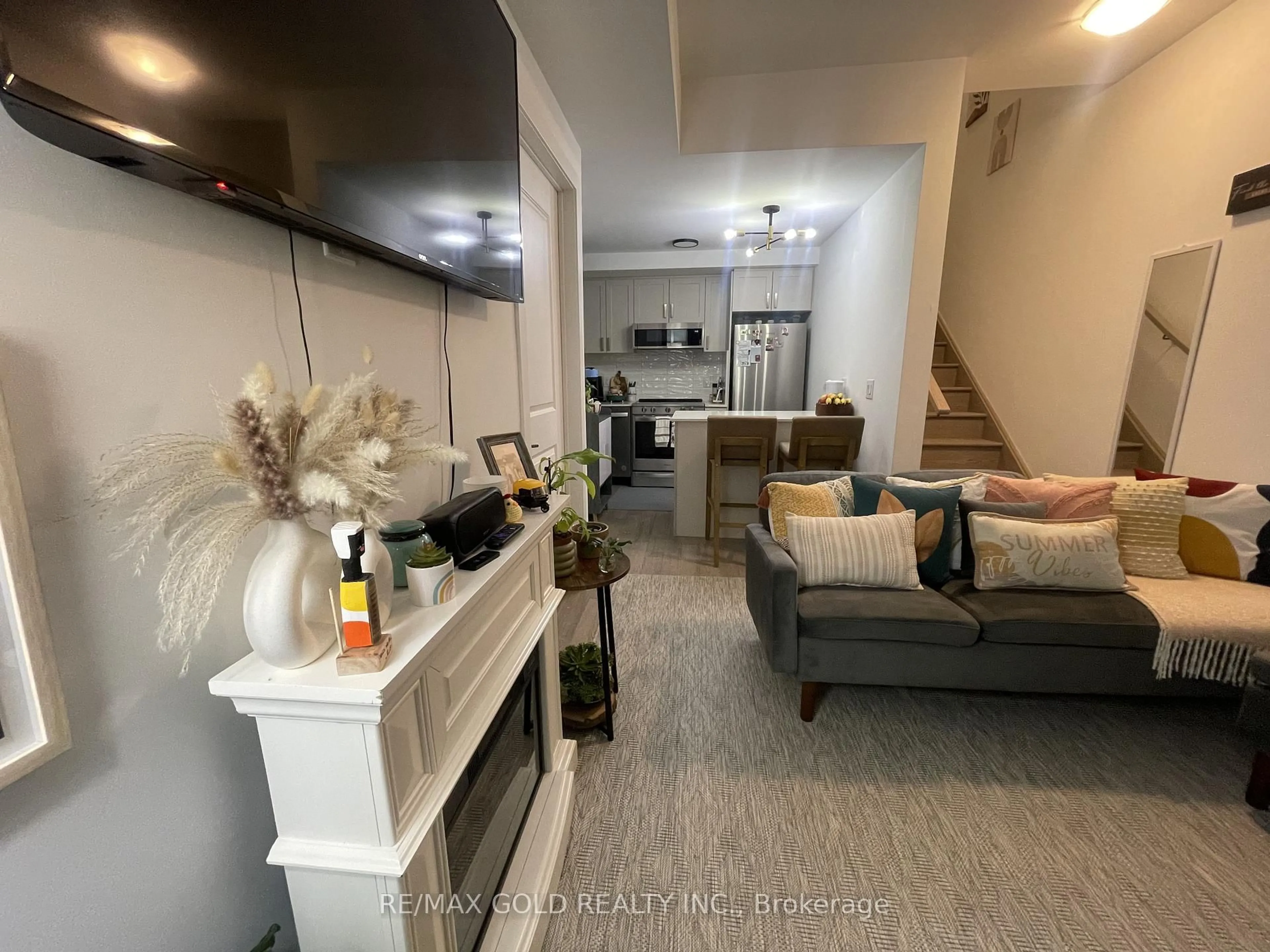 Living room with furniture, unknown for 1115 Douglas McCurdy Comm Dr #102, Mississauga Ontario L5G 0C6