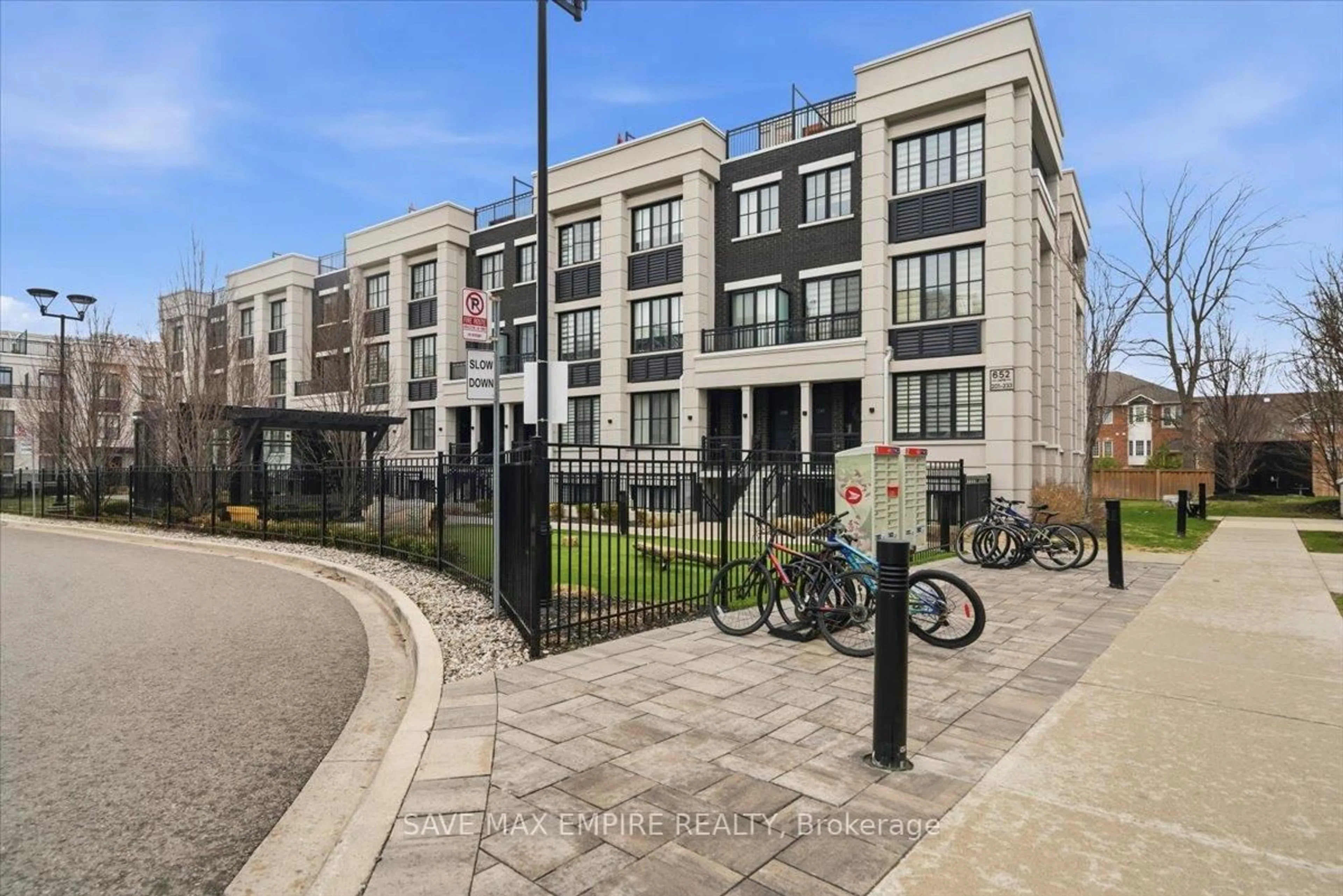 A pic from outside/outdoor area/front of a property/back of a property/a pic from drone, street for 652 Cricklewood Dr #227, Mississauga Ontario L5G 0B7