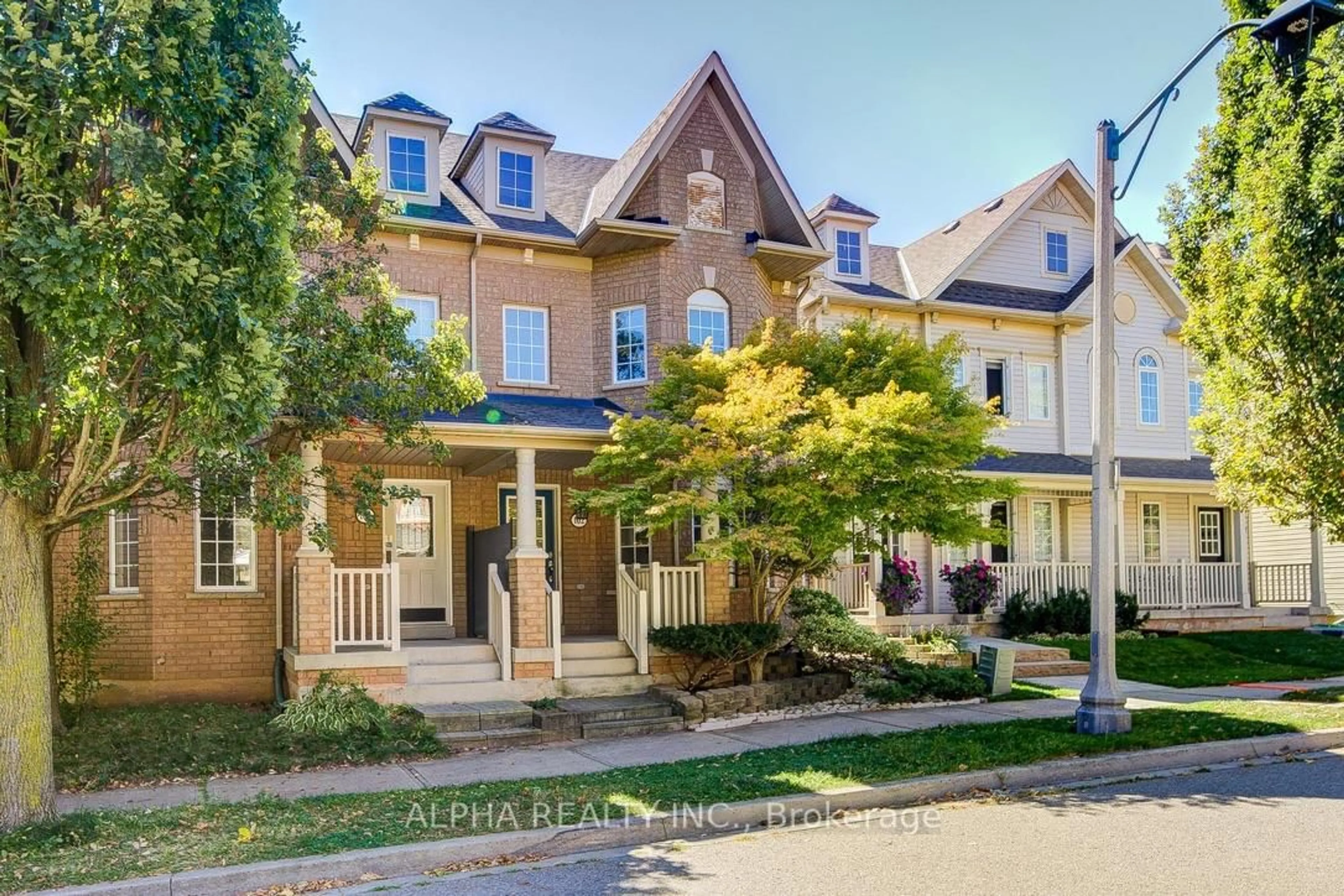 Home with brick exterior material, street for 102 Roxton Rd, Oakville Ontario L6H 6V4