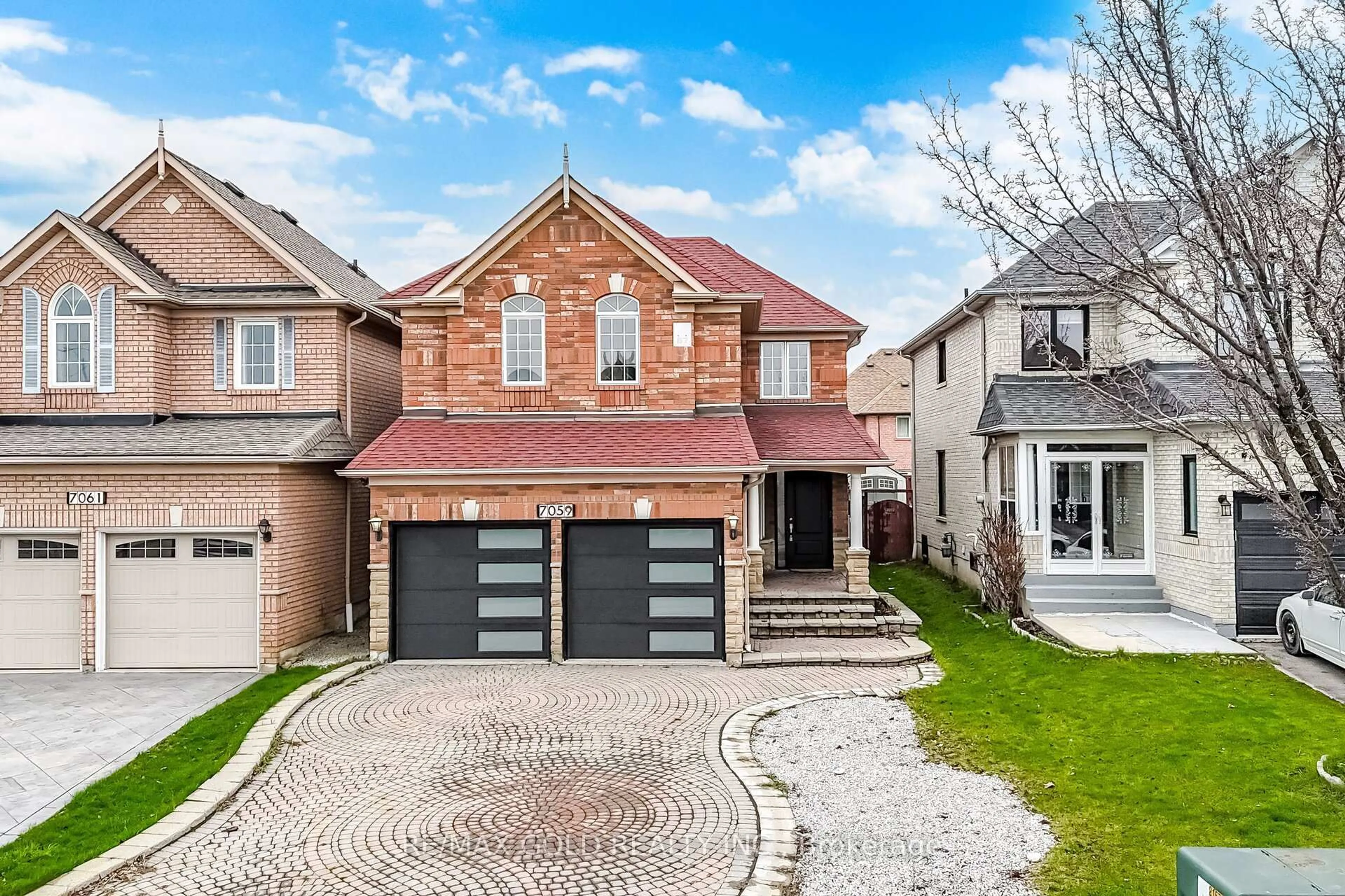 Home with brick exterior material, street for 7059 Magistrate Terr, Mississauga Ontario L5W 1E5